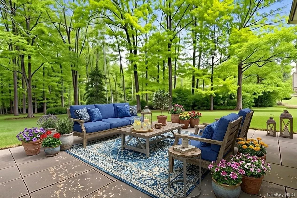 Virtually staged with conversational seating and flowering pots Virtually staged with conversational seating and flowering pots