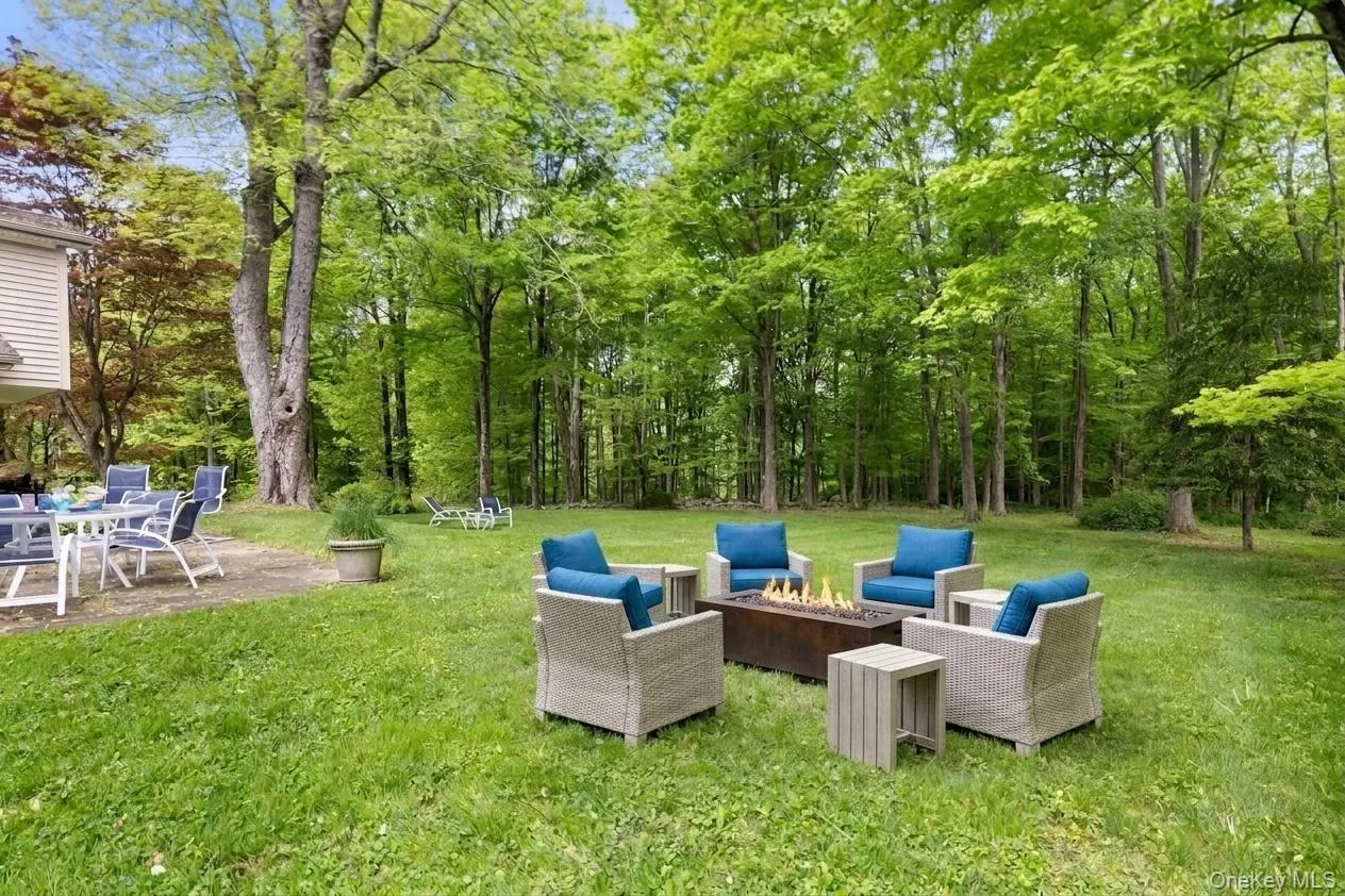 Virtually staged with conversational sitting and a firepit Virtually staged with conversational sitting and a firepit