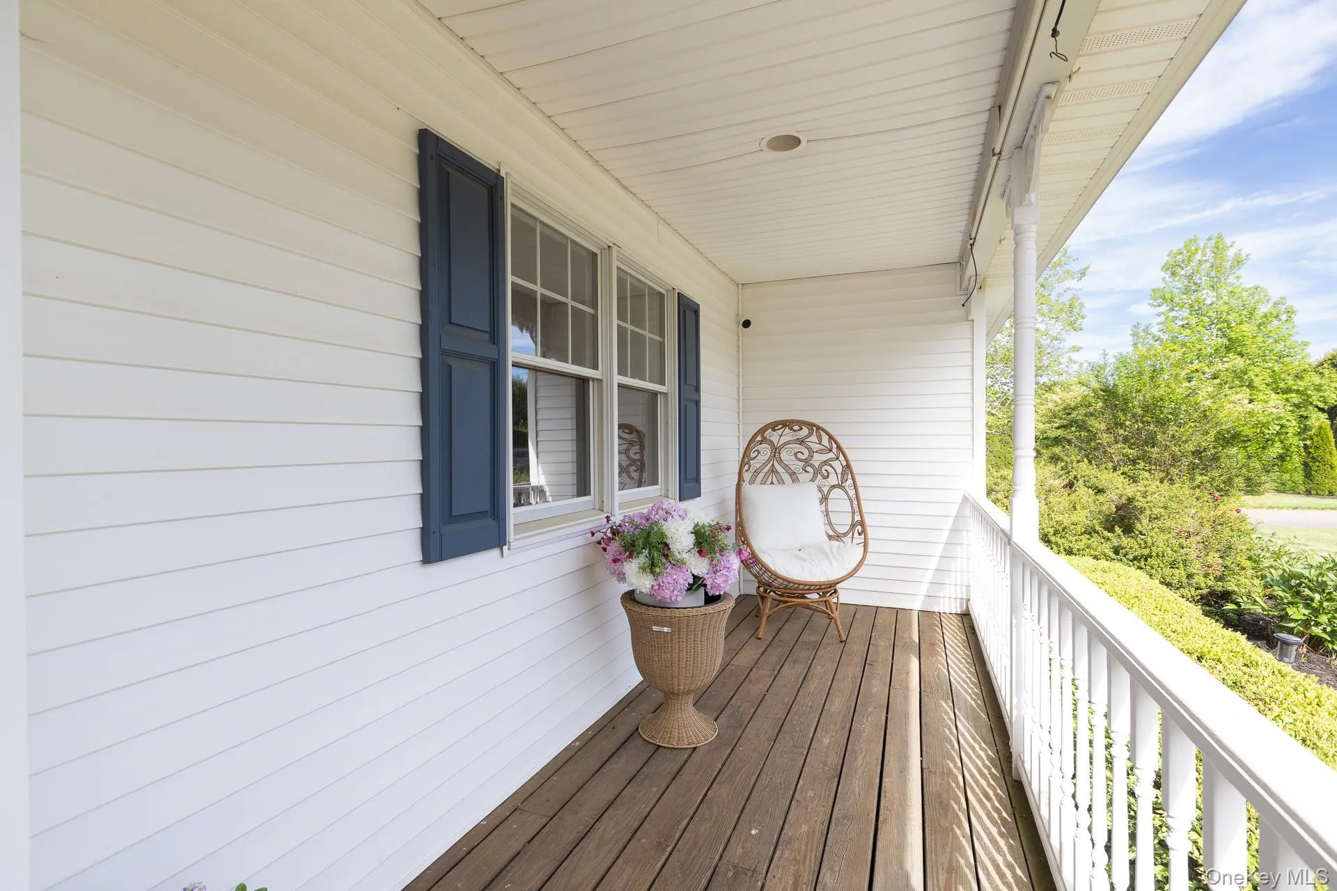 Relax on the expansive, covered wraparound porch overlooking a beautifully manicured lawn and a quiet, tree-lined street with the ultimate benefit of no front neighbors." Relax on the expansive, covered wraparound porch overlooking a beautifully manicured lawn and a quiet, tree-lined street with the ultimate benefit of no front neighbors."