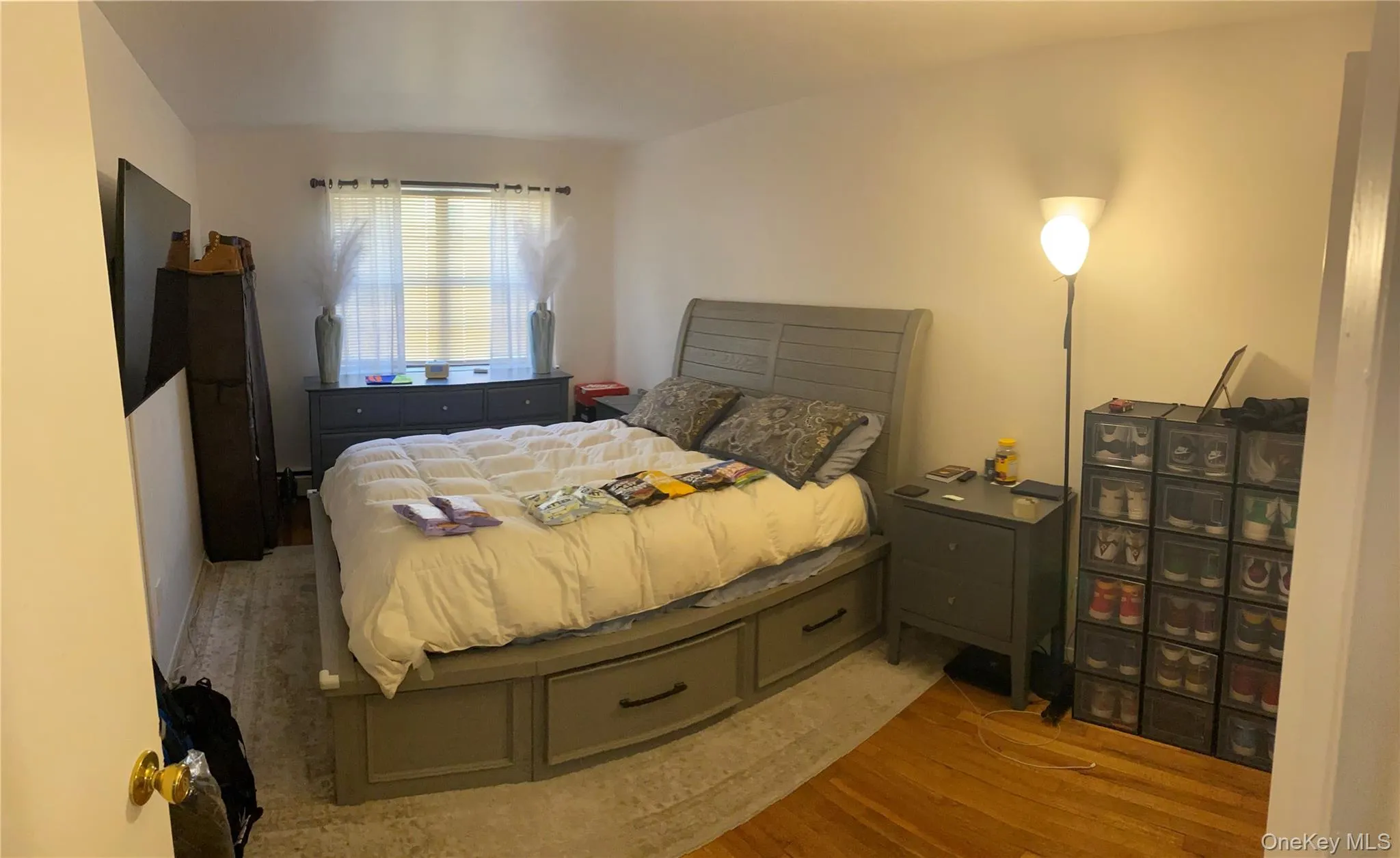 Bedroom with light wood-style floors Bedroom with light wood-style floors
