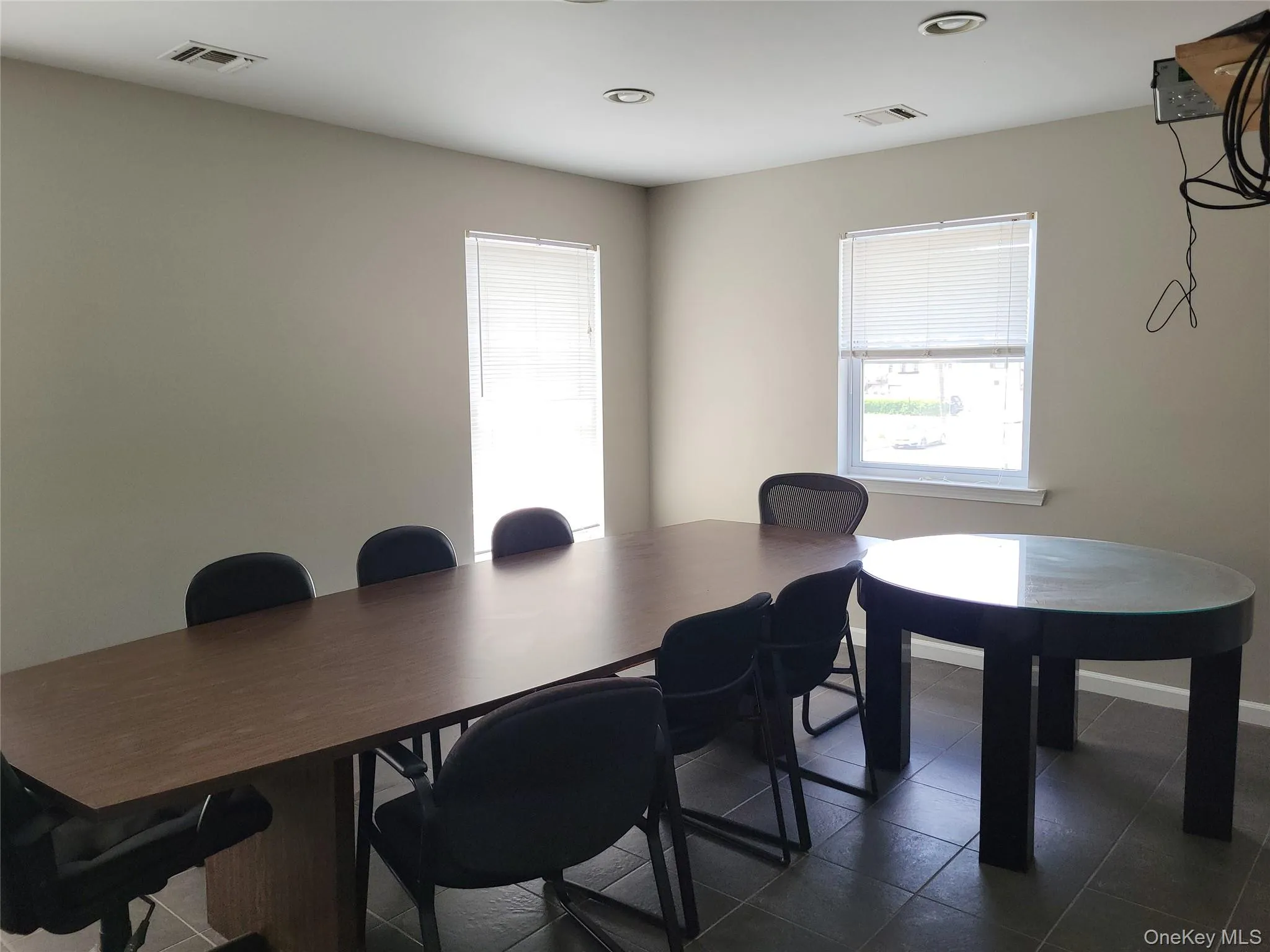 A large conference room withlarge table A large conference room withlarge table
