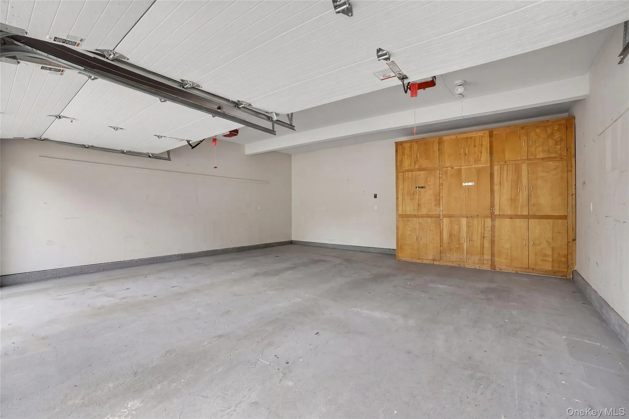 Two-Car Garage with cabinets Two-Car Garage with cabinets