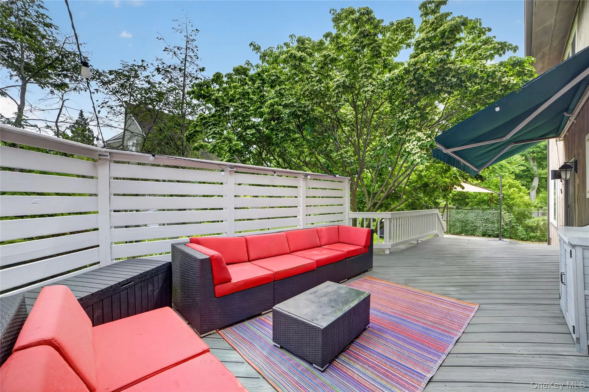 TREX Deck with awning opens to yard TREX Deck with awning opens to yard