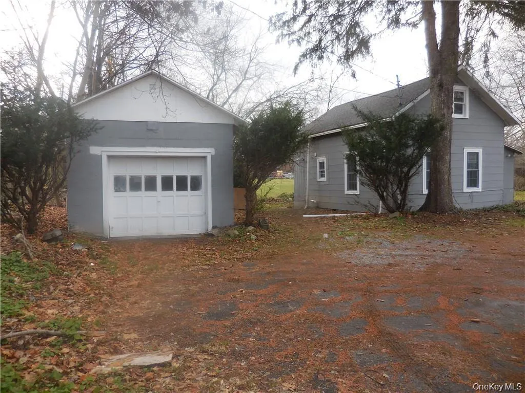Front of the detached building which can be used as a storage... Front of the detached building which can be used as a storage...