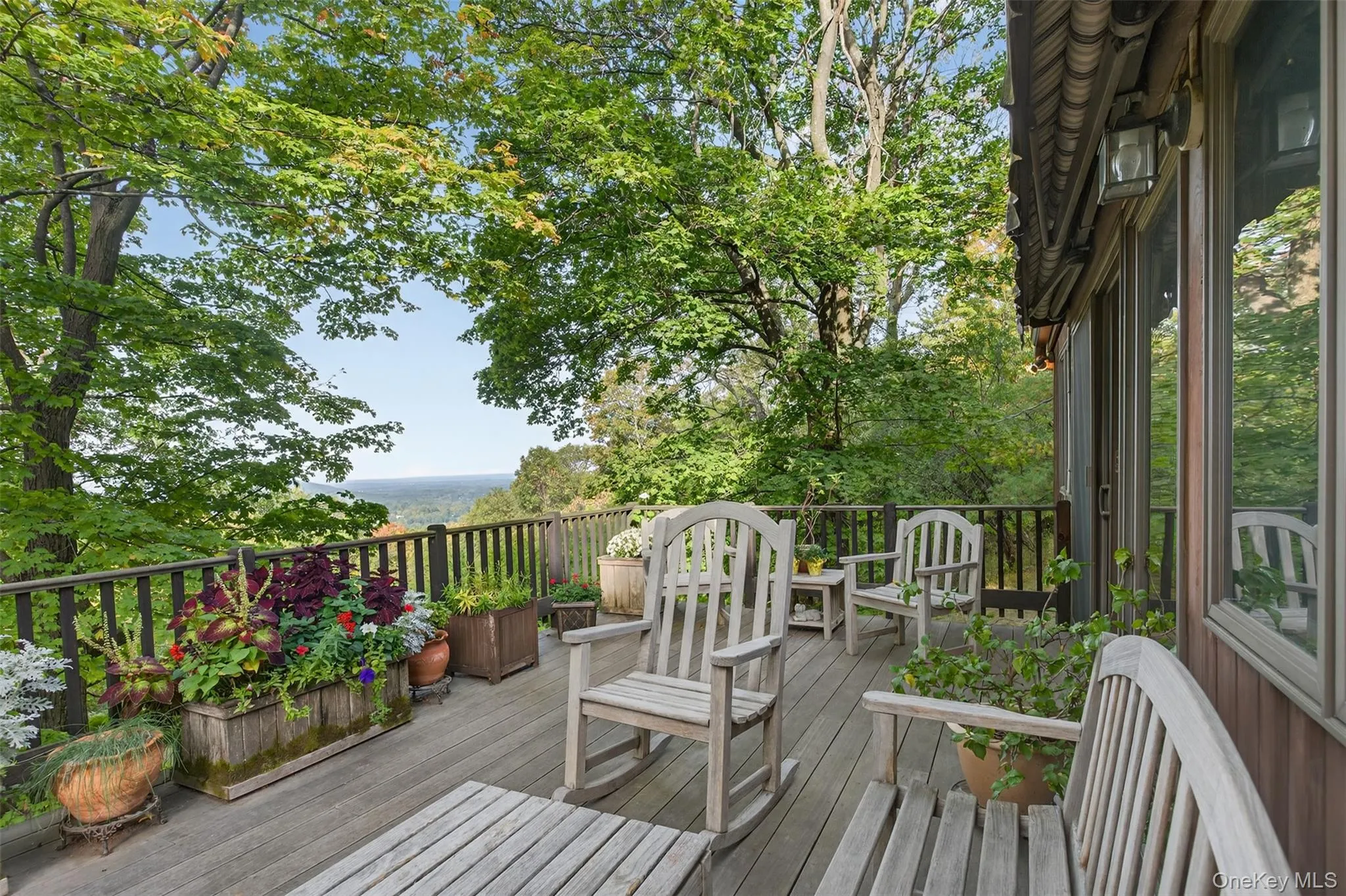 Deck off Main Living Room with Sweeping Mountain views + sunsets Deck off Main Living Room with Sweeping Mountain views + sunsets