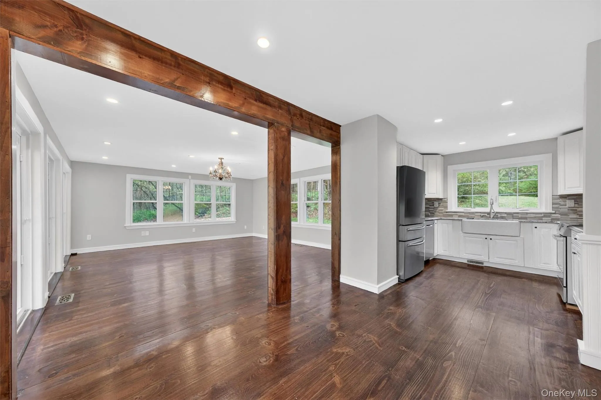 Open-plan kitchen, dining area, and living room. Open-plan kitchen, dining area, and living room.