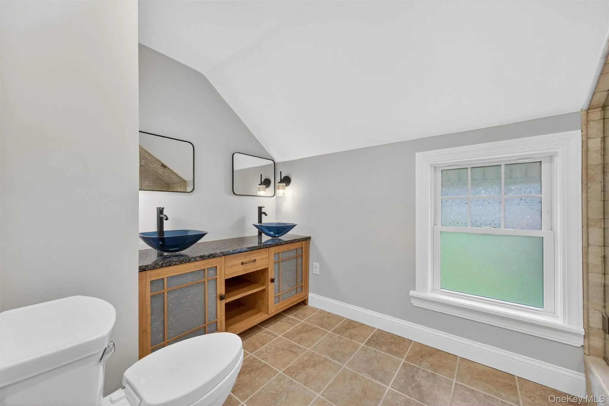 Hall bathroom w/ 2 vanities. Hall bathroom w/ 2 vanities.