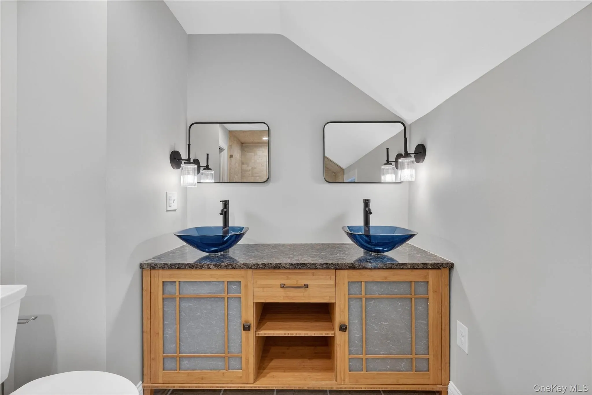 Hall bathroom w/ 2 vanities. Hall bathroom w/ 2 vanities.