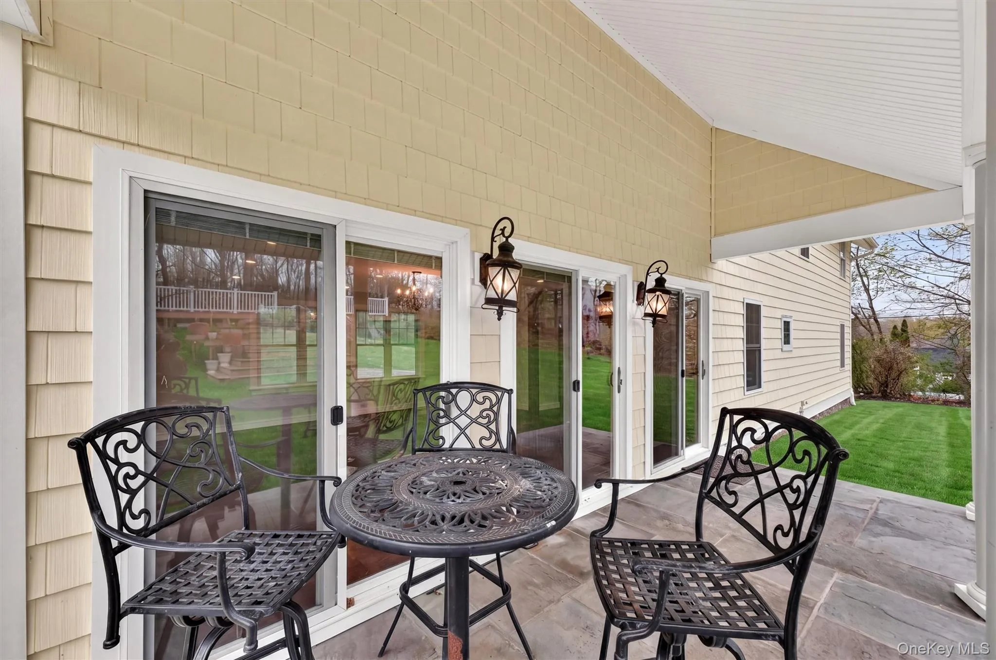Blue stone patio and outdoor seating area. Blue stone patio and outdoor seating area.