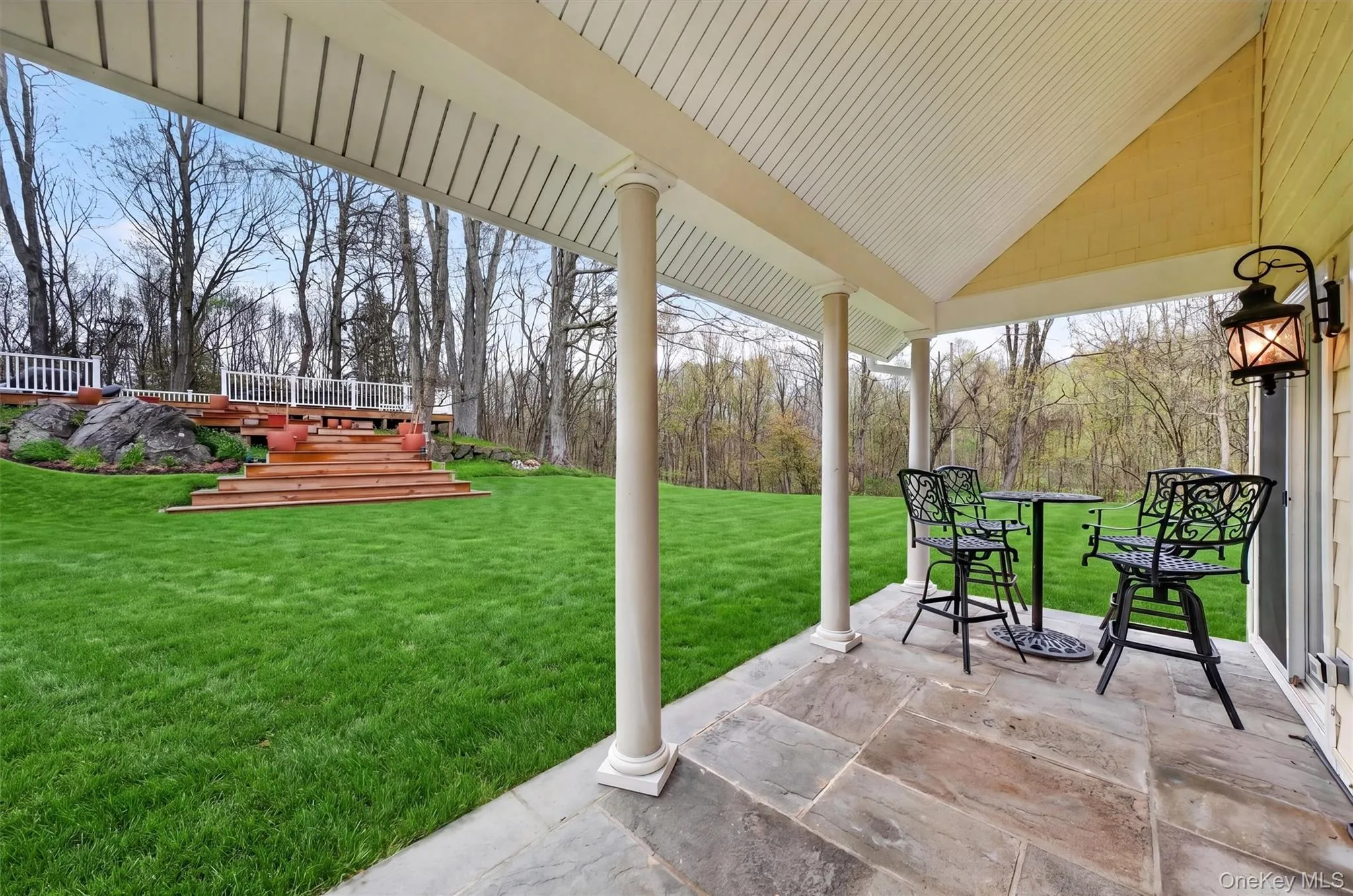 Blue stone patio and outdoor seating area. Blue stone patio and outdoor seating area.