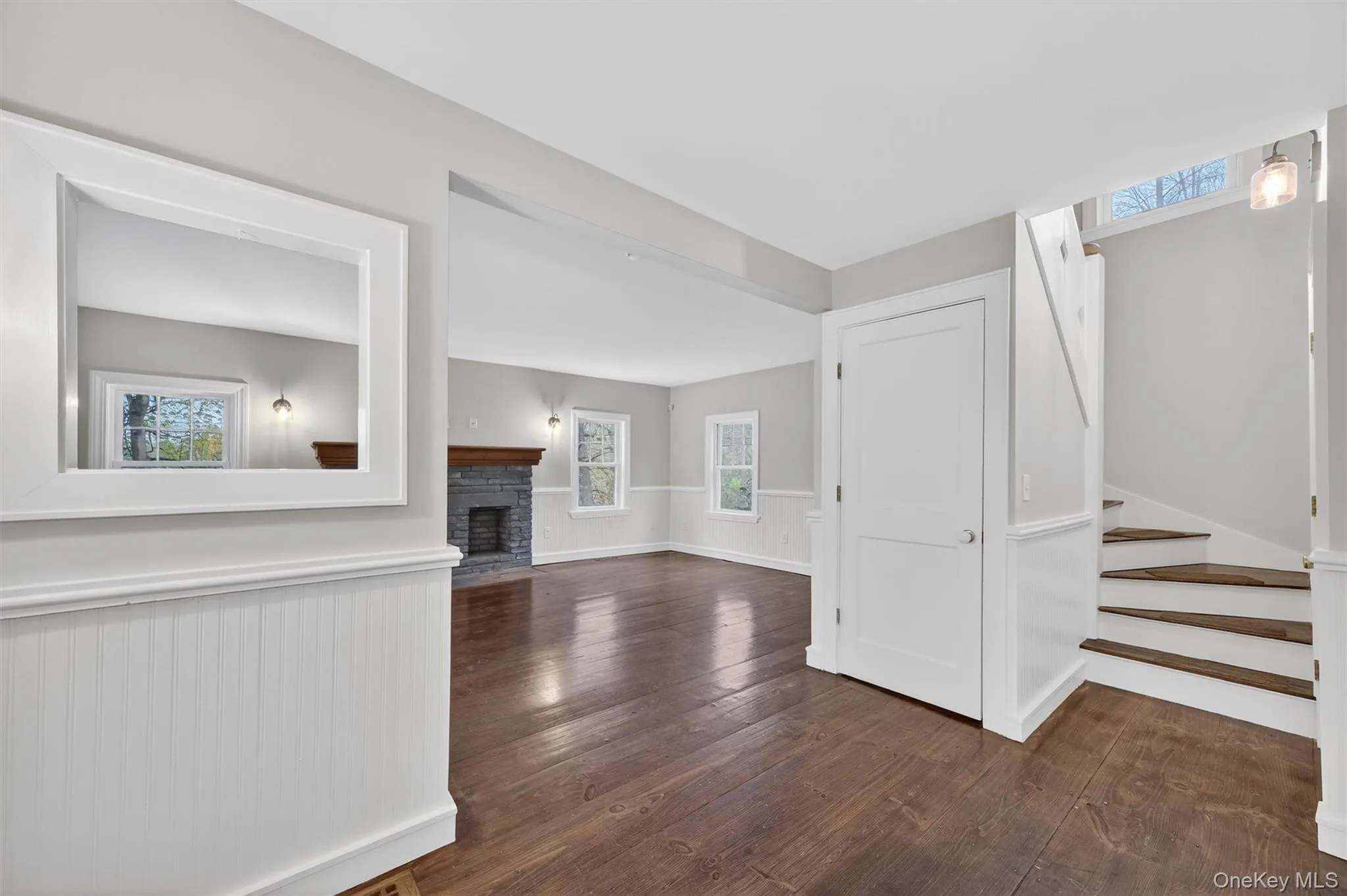 Entryway connects the formal living room, powder room, staircases, & kitchen/dining area. Entryway connects the formal living room, powder room, staircases, & kitchen/dining area.