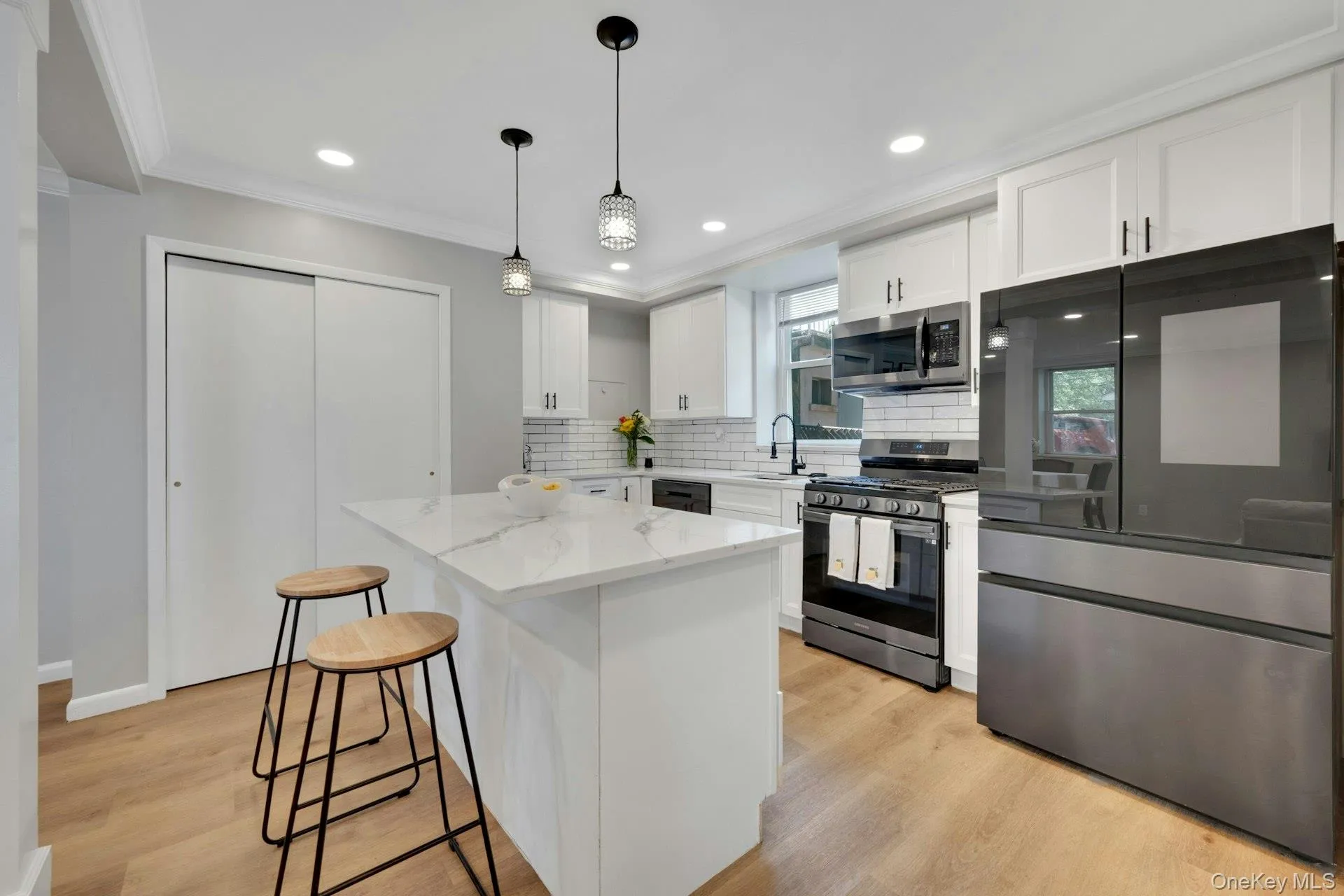 Remodeled kitchen showing the stainless-steel appliances Remodeled kitchen showing the stainless-steel appliances