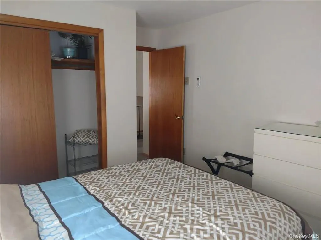 Bedroom with a closet Bedroom with a closet