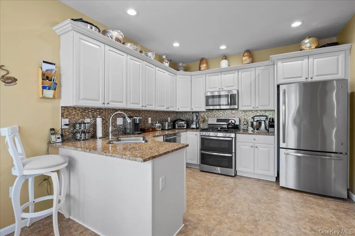 Updated kitchen with stainless steel appliances Updated kitchen with stainless steel appliances