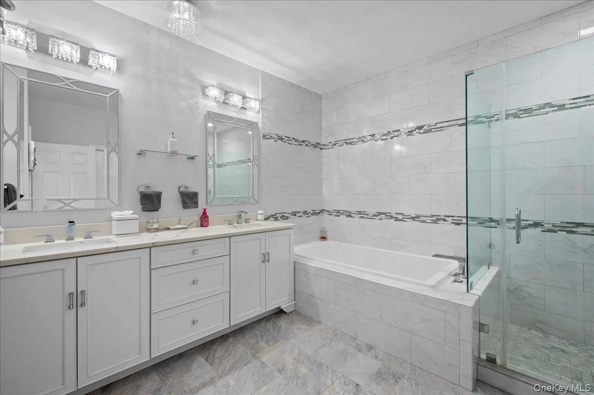 New Primary bathroom with air jacuzzi tub,and double vanity New Primary bathroom with air jacuzzi tub,and double vanity