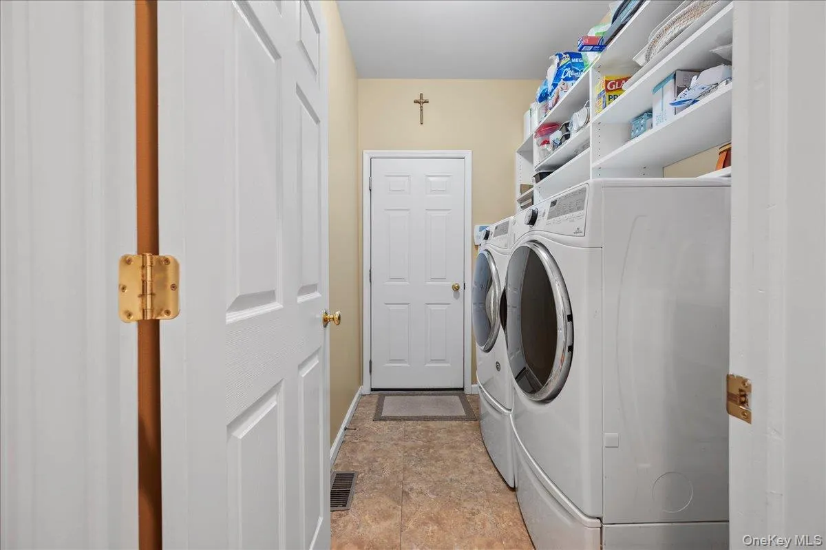 Laundry Room with Front Loading Washer and Dryer Laundry Room with Front Loading Washer and Dryer