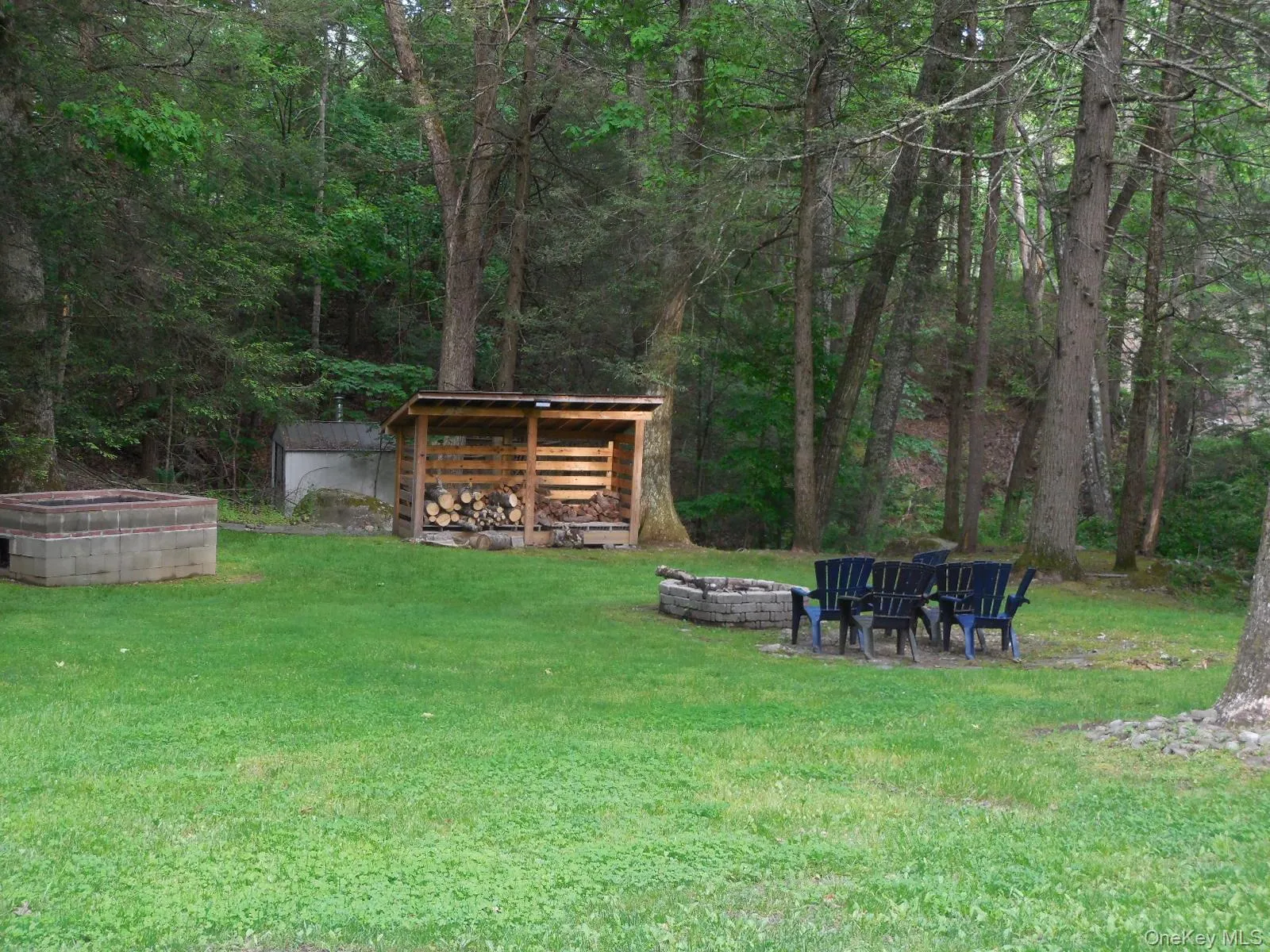 Stargaze at the Firepit. A wood shelter & custom BBQ pit created for serious entertaining! Stargaze at the Firepit. A wood shelter & custom BBQ pit created for serious entertaining!