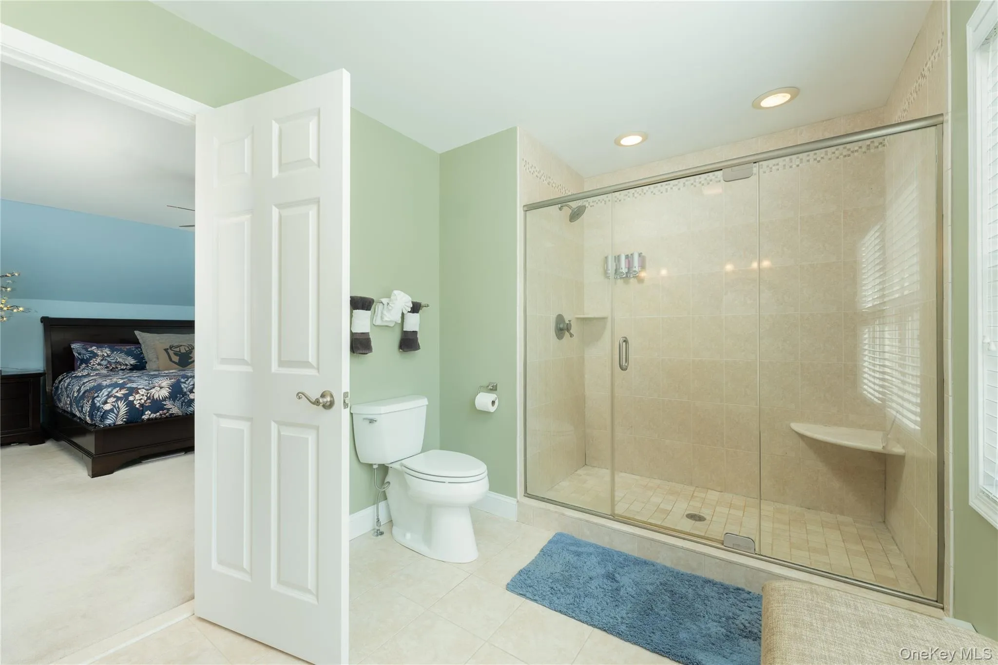 Oversized tile shower with built ins. Oversized tile shower with built ins.