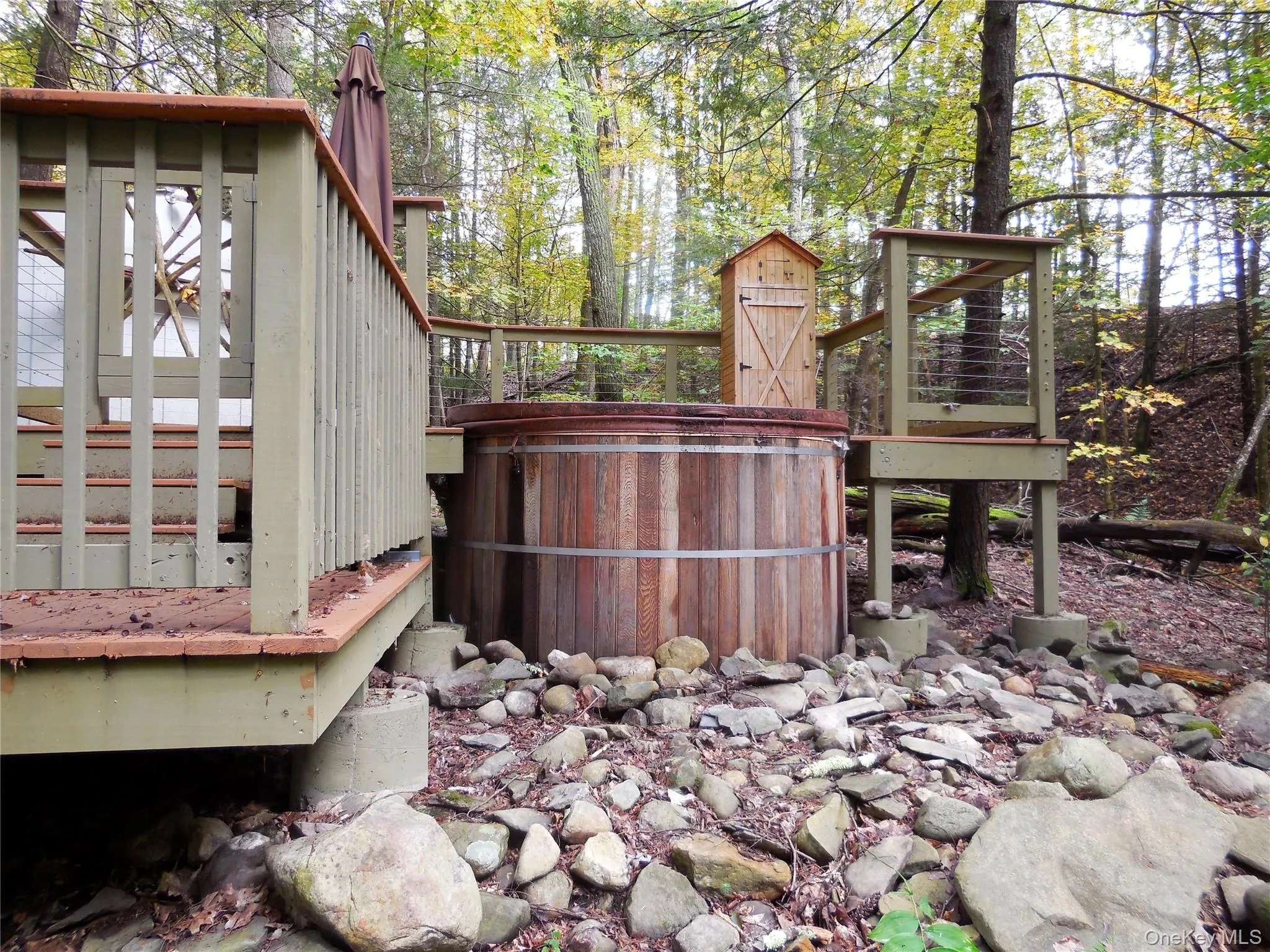 Relax & unwind in the hottub while listening to the stream below Relax & unwind in the hottub while listening to the stream below