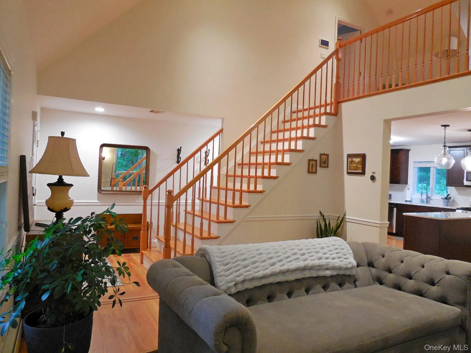 Beautiful oak railed stairs leading to open loft above Beautiful oak railed stairs leading to open loft above