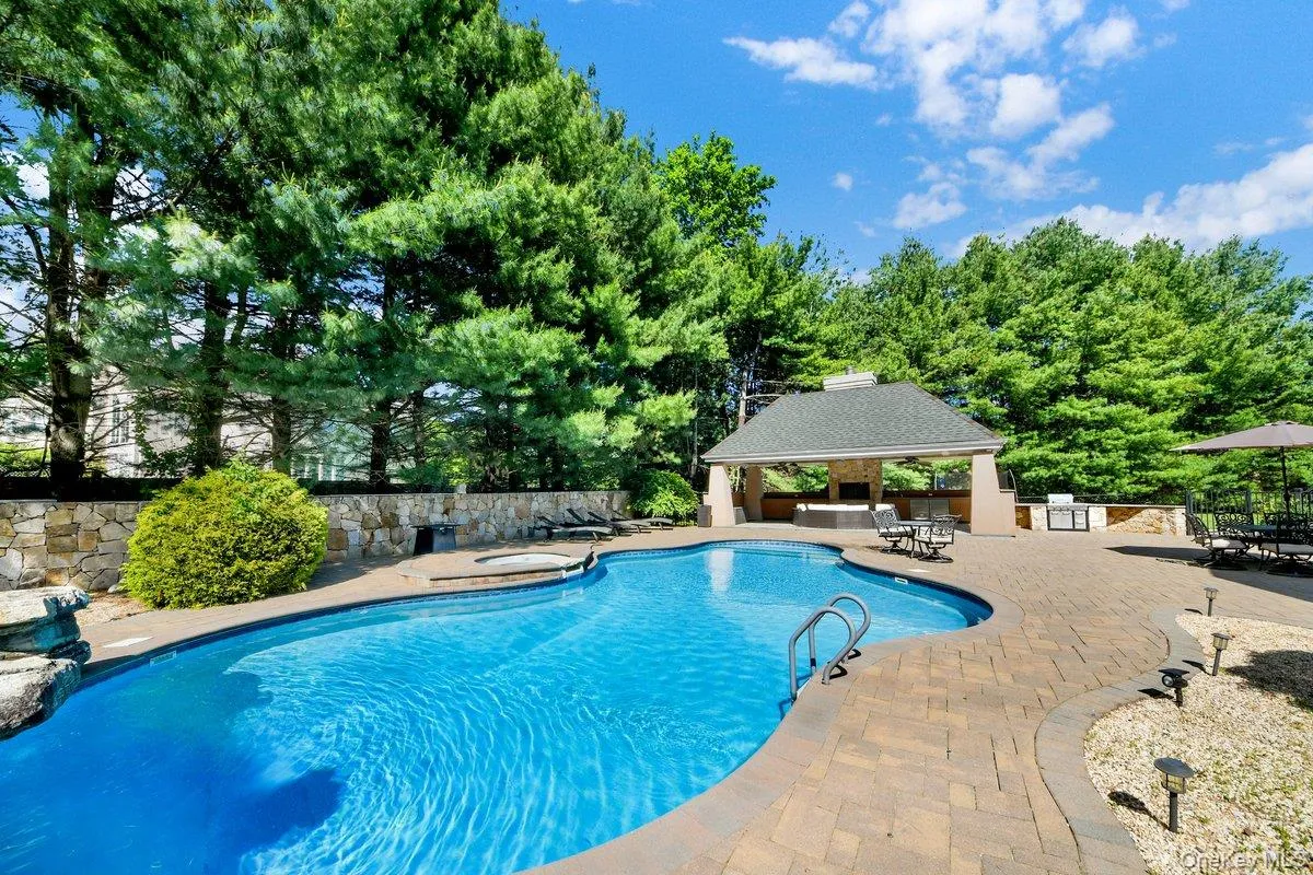 In-Ground 44' x 24' Freeform Heated Pool w. Rock Waterfall and Hot Tub In-Ground 44' x 24' Freeform Heated Pool w. Rock Waterfall and Hot Tub