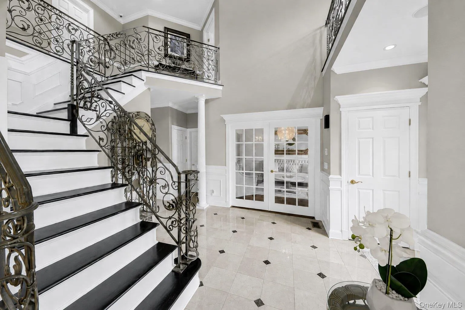 Iron Railings, Wainscot, Marble Floor, 2 Closets, Juliet Balcony above Front Entrance Iron Railings, Wainscot, Marble Floor, 2 Closets, Juliet Balcony above Front Entrance