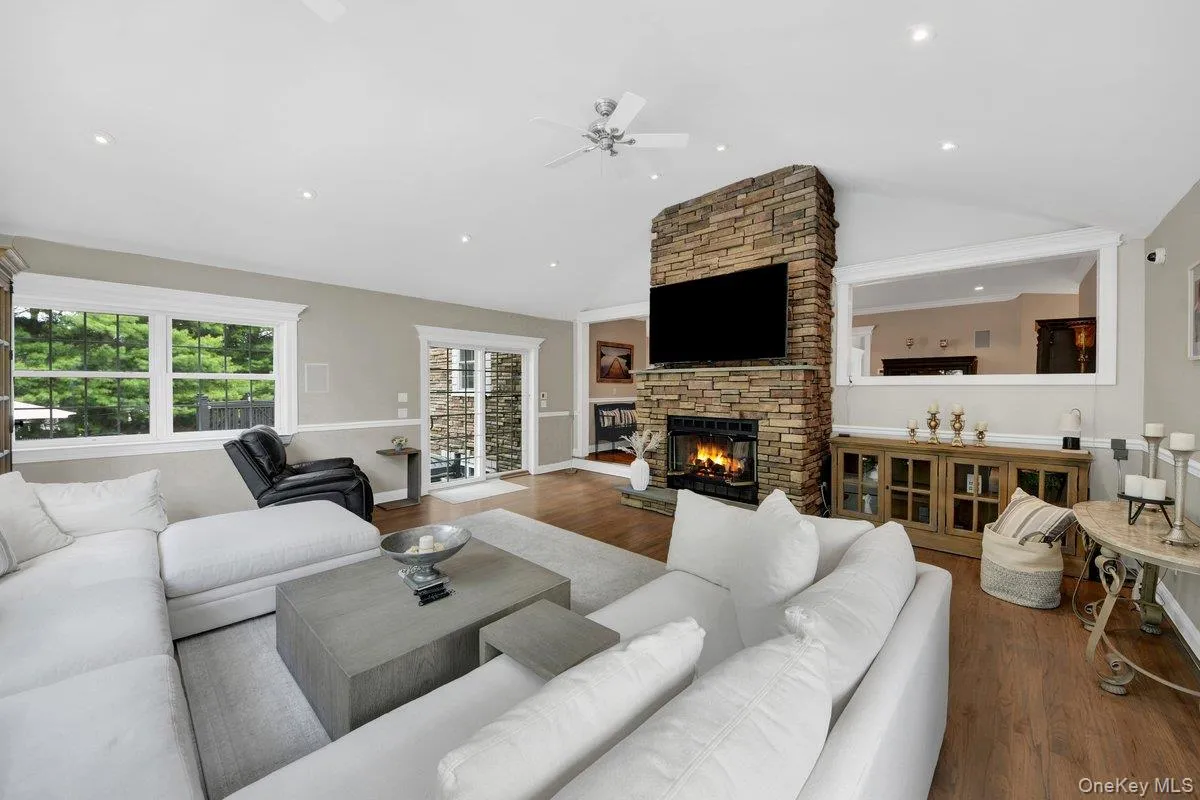 Great Room features a Gas Fireplace, Sliding Glass Doors Leading to a Private Hot Tub Retreat Great Room features a Gas Fireplace, Sliding Glass Doors Leading to a Private Hot Tub Retreat
