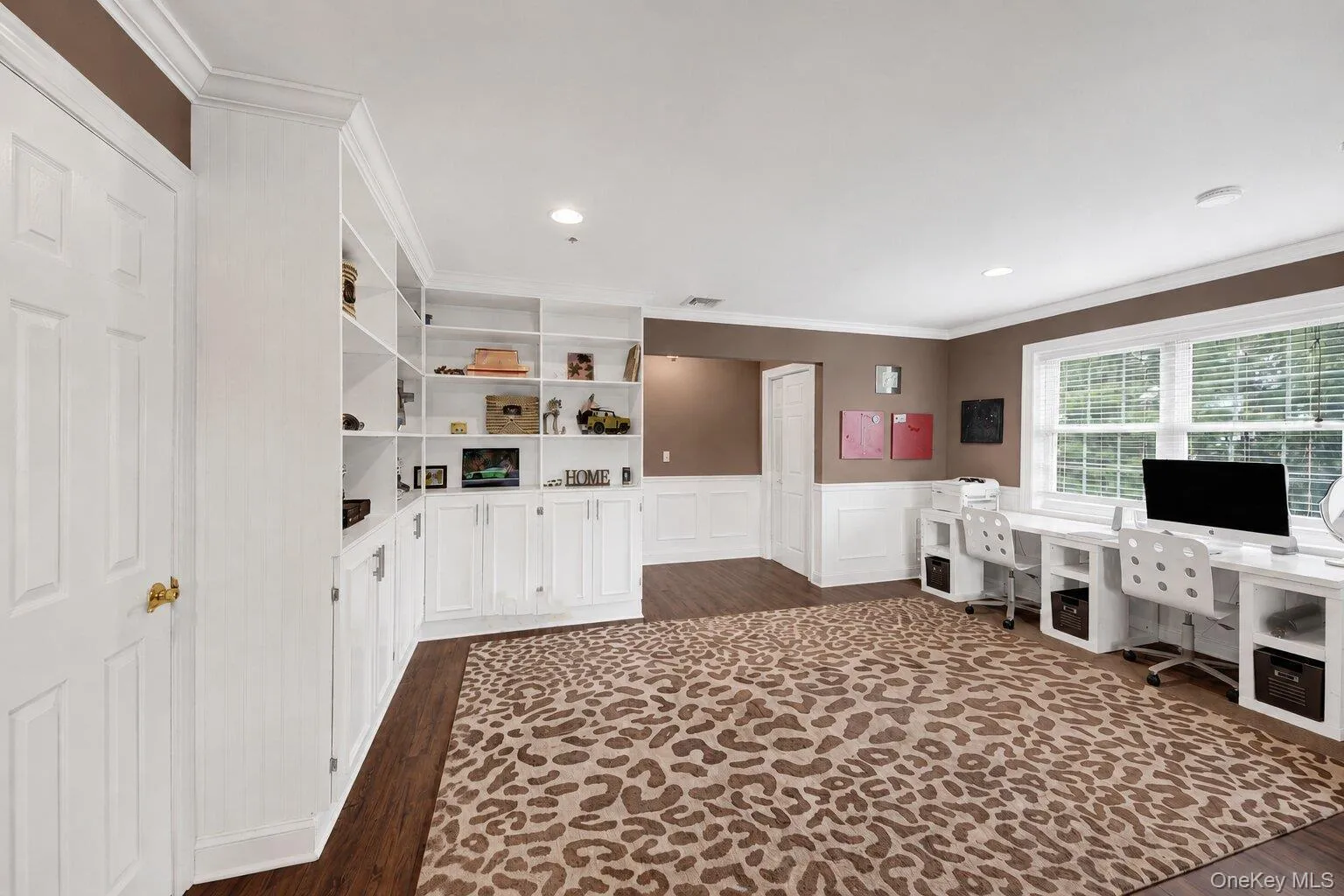 Built-In Bookcase, Wainscot, Recessed Lighting, Secondary Staircase to the Kitchen Built-In Bookcase, Wainscot, Recessed Lighting, Secondary Staircase to the Kitchen