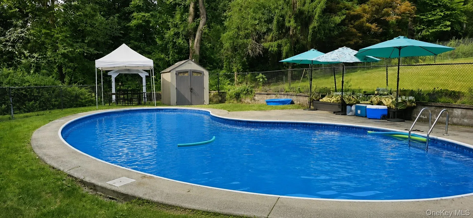 Splash in the refreshing Inground Kidney Shaped Pool Splash in the refreshing Inground Kidney Shaped Pool