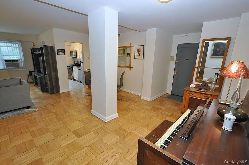 Large entry foyer has three large closet and is a great space for a home office set up. The foyer opens to both the dining area and living room. The foyer is approx 13'-0" x 7'-2". Large entry foyer has three large closet and is a great space for a home office set up. The foyer opens to both the dining area and living room. The foyer is approx 13'-0" x 7'-2".