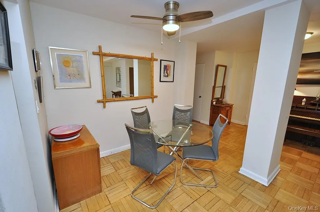 Dining area opens to the living room and entry foyers. Dining area is approx 10'-0" x 7'-0" Dining area opens to the living room and entry foyers. Dining area is approx 10'-0" x 7'-0"