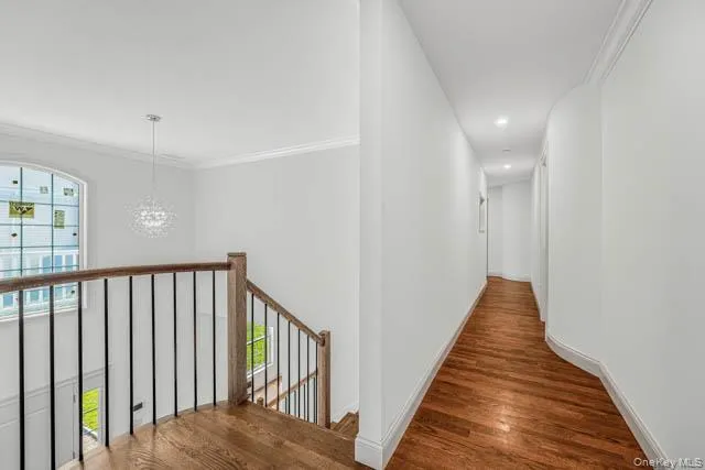 Hardwood flooring throughout the upper landing and hallway Hardwood flooring throughout the upper landing and hallway