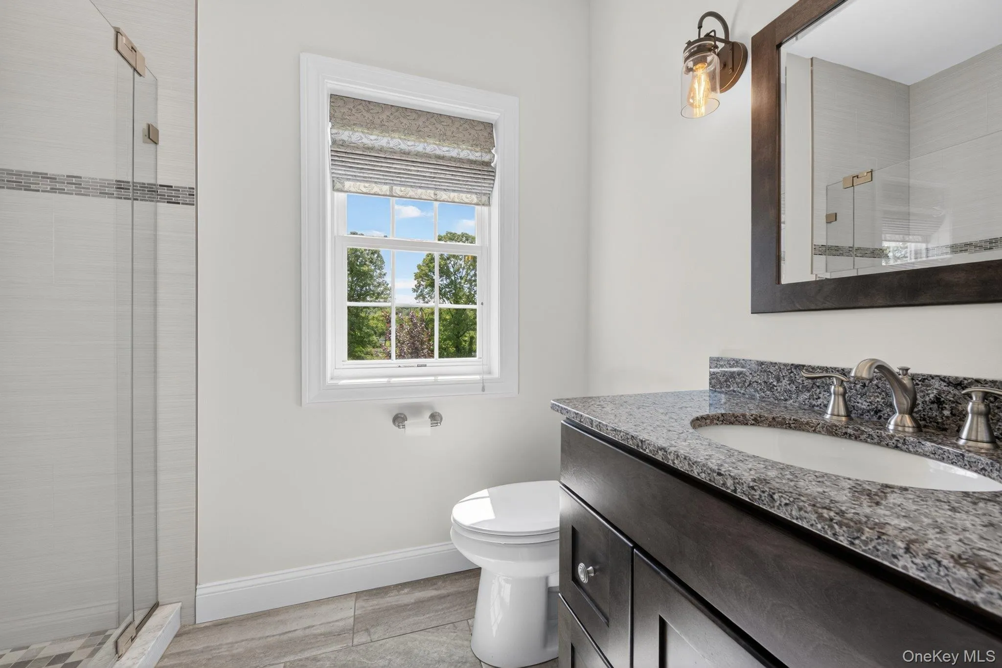 Vanity with granite countertop and undermount sink Vanity with granite countertop and undermount sink