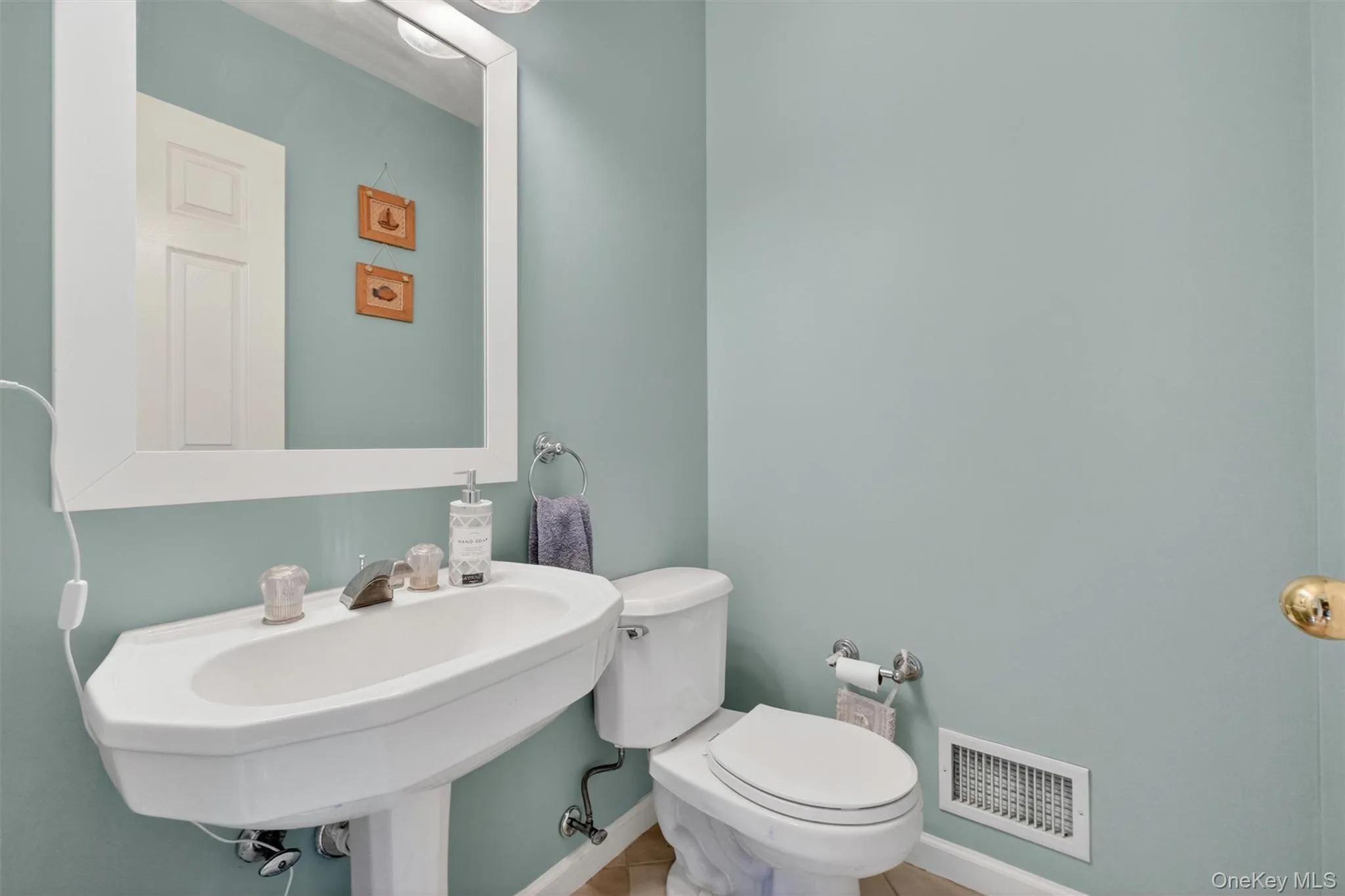 First floor powder room. First floor powder room.