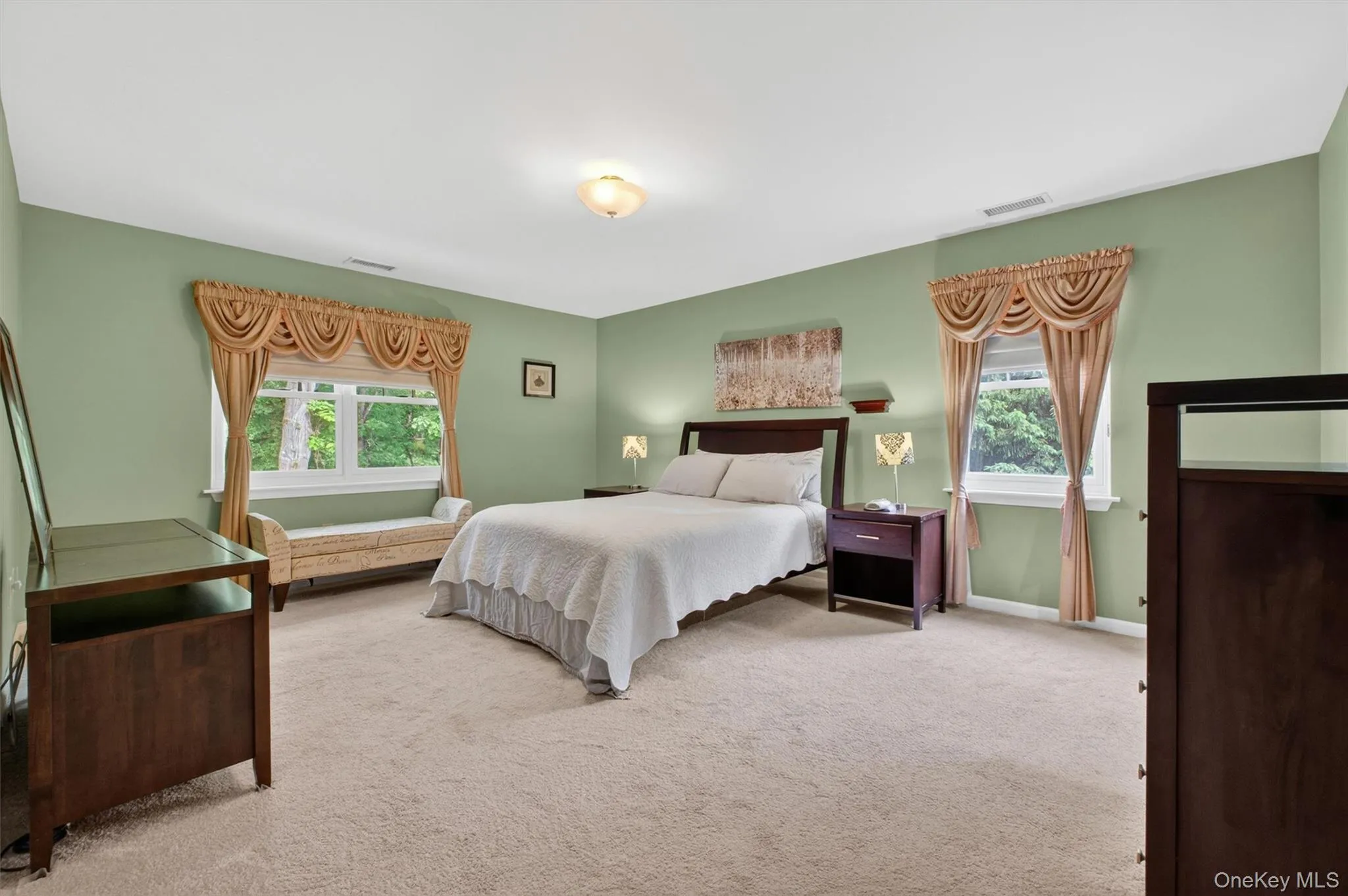 Generously sized primary bedroom suite. Generously sized primary bedroom suite.