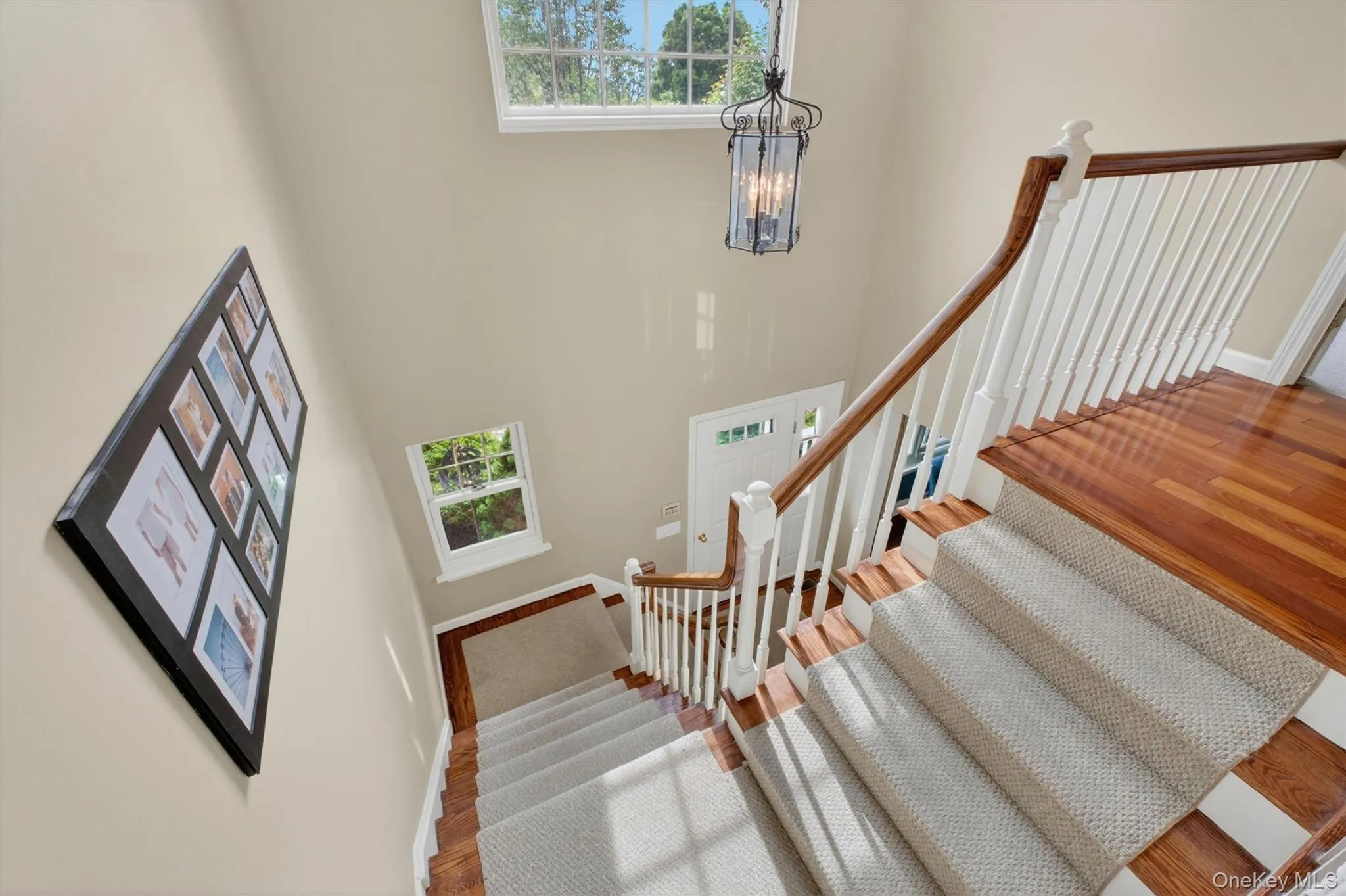 Staircase and open foyer showcasing the home’s airy layout. Staircase and open foyer showcasing the home’s airy layout.