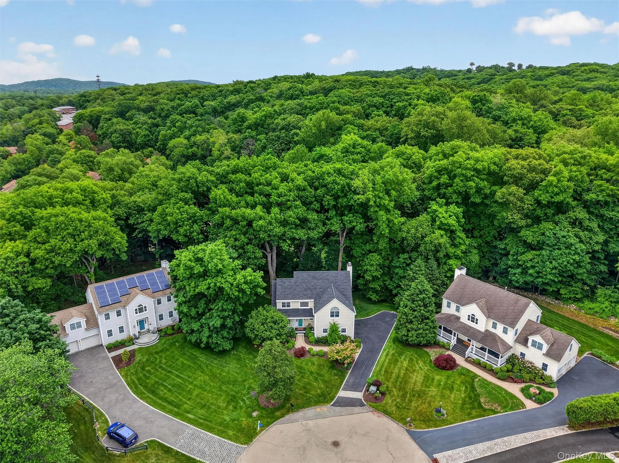 Aerial view highlighting the home’s private setting at the end of the cul-de-sac. Aerial view highlighting the home’s private setting at the end of the cul-de-sac.