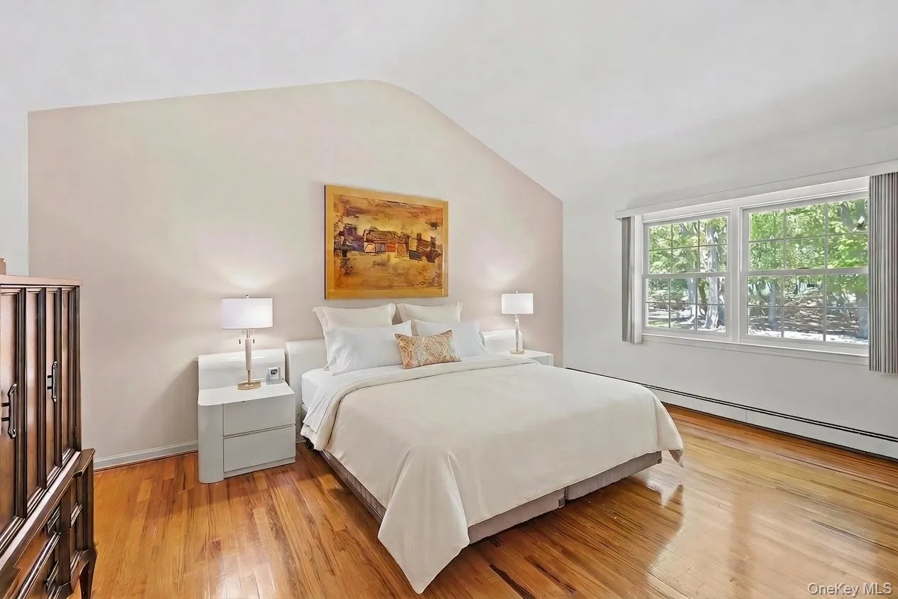 Spacious primary bedroom with en-suite bathroom Spacious primary bedroom with en-suite bathroom