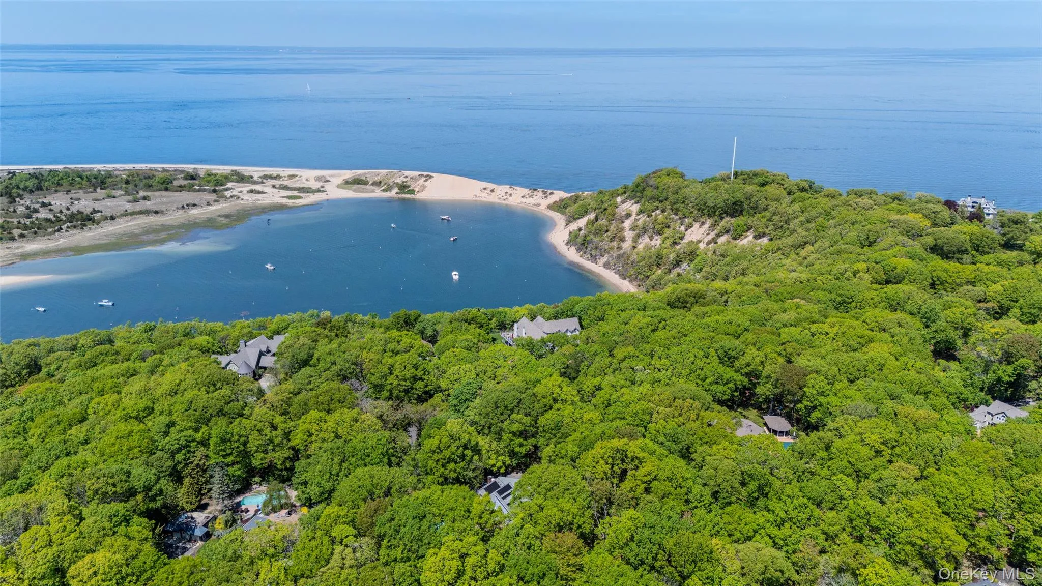 Aerial view of home and broader view of Pirates Cove and Mt. Sinai Harbor Aerial view of home and broader view of Pirates Cove and Mt. Sinai Harbor