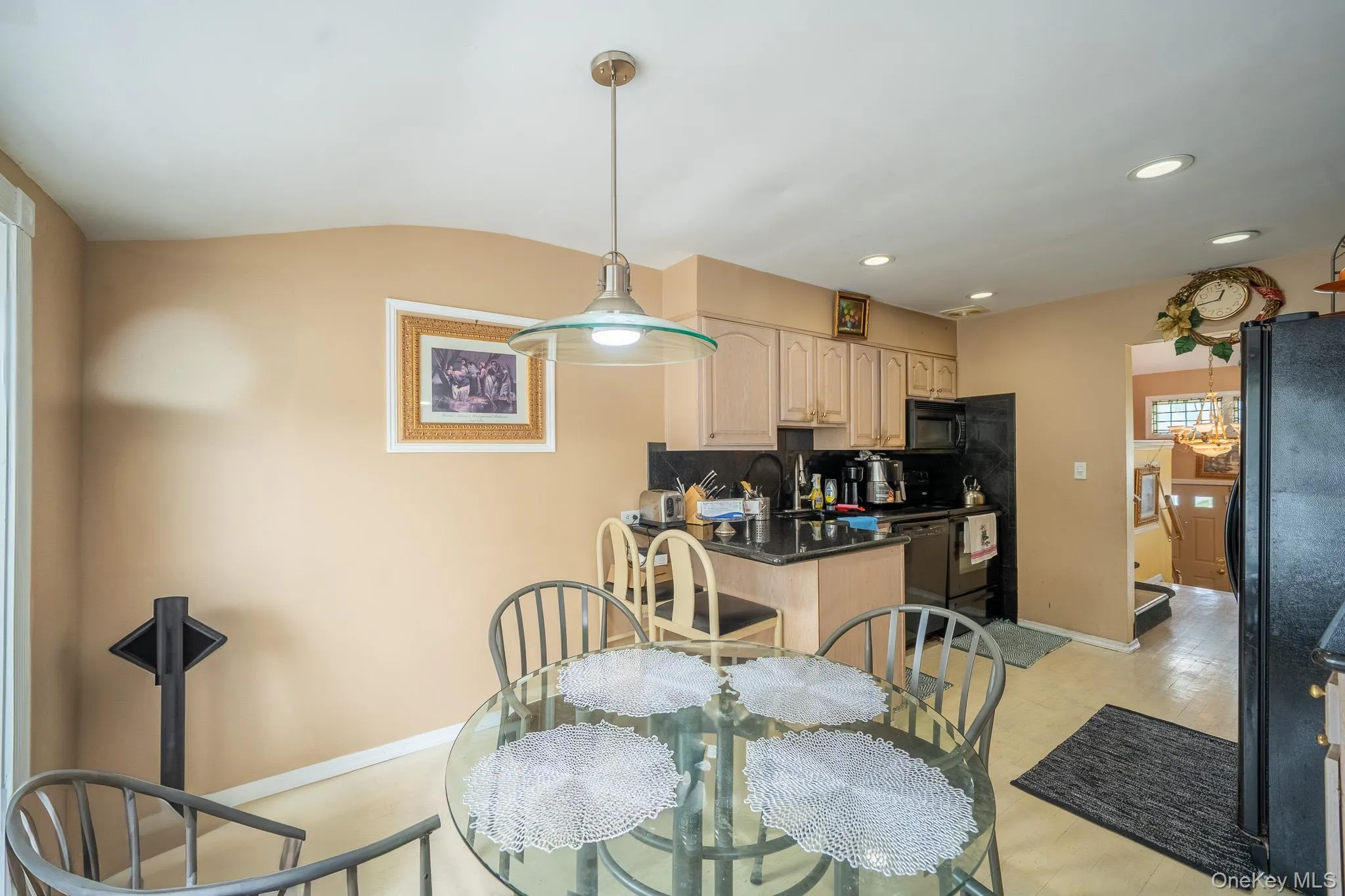 Dining room featuring baseboards and recessed lighting Dining room featuring baseboards and recessed lighting