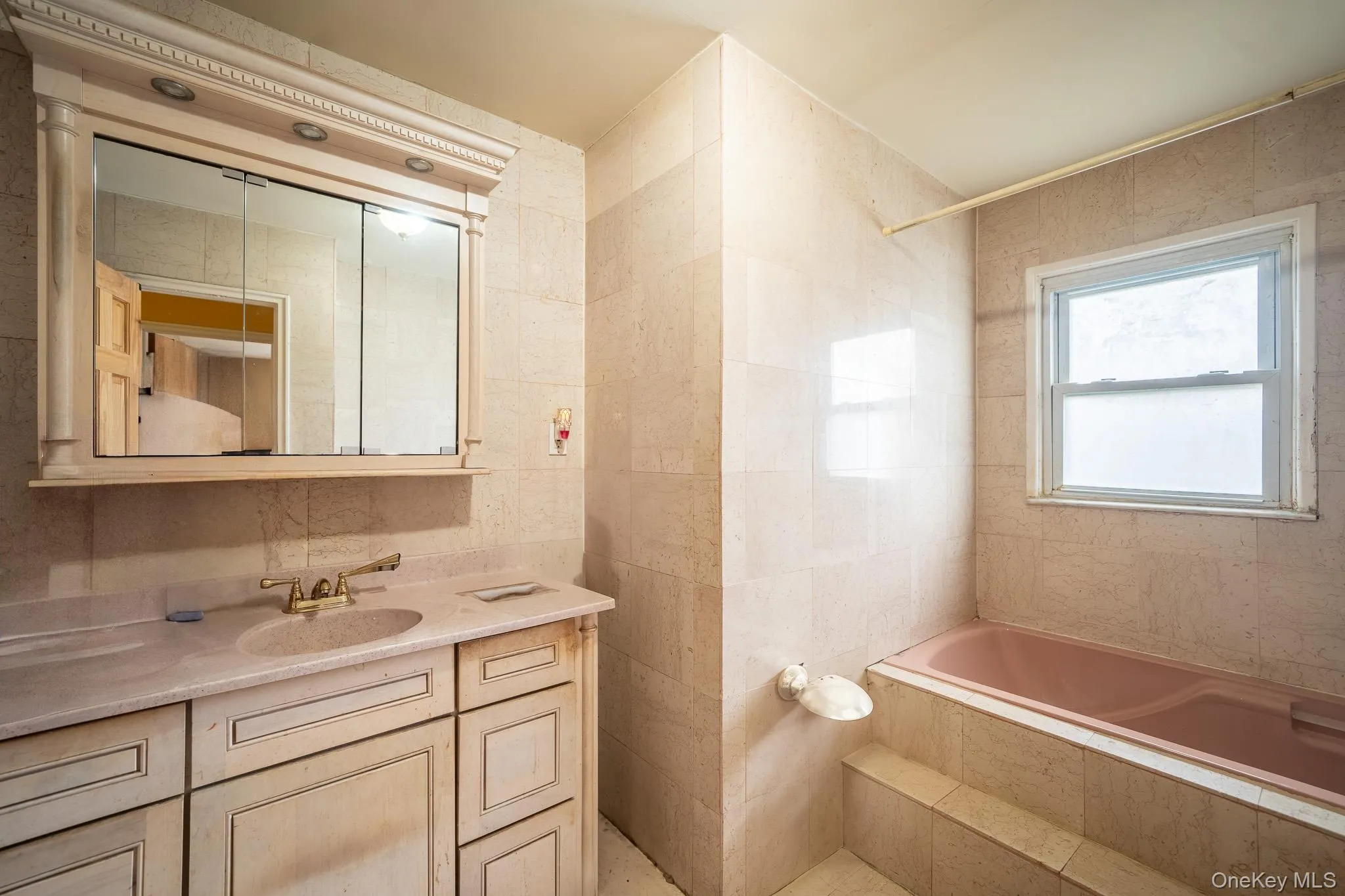 Bathroom with vanity and tile walls Bathroom with vanity and tile walls