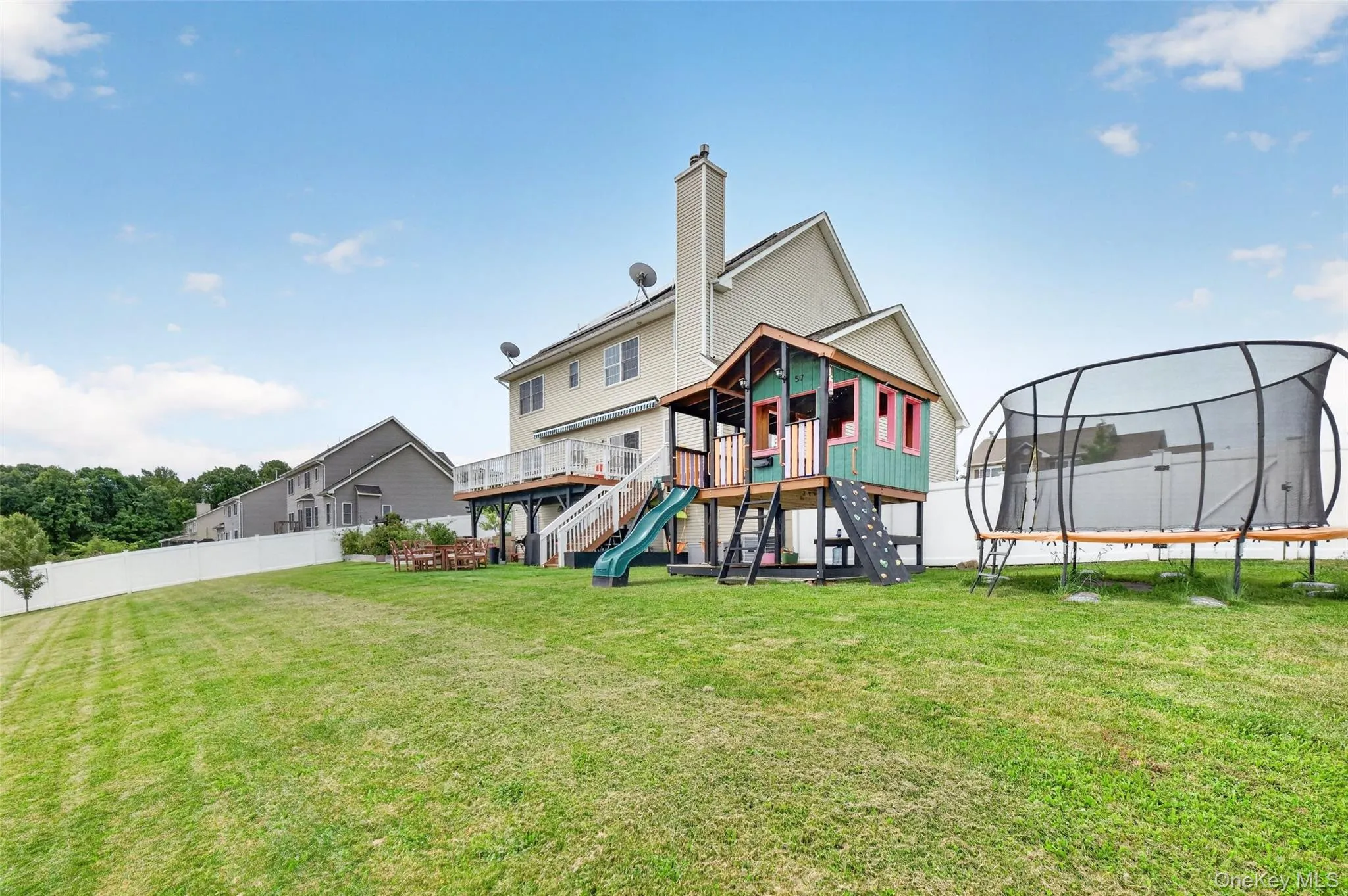 Expansive, Fenced Back Yard with Playhouse Expansive, Fenced Back Yard with Playhouse