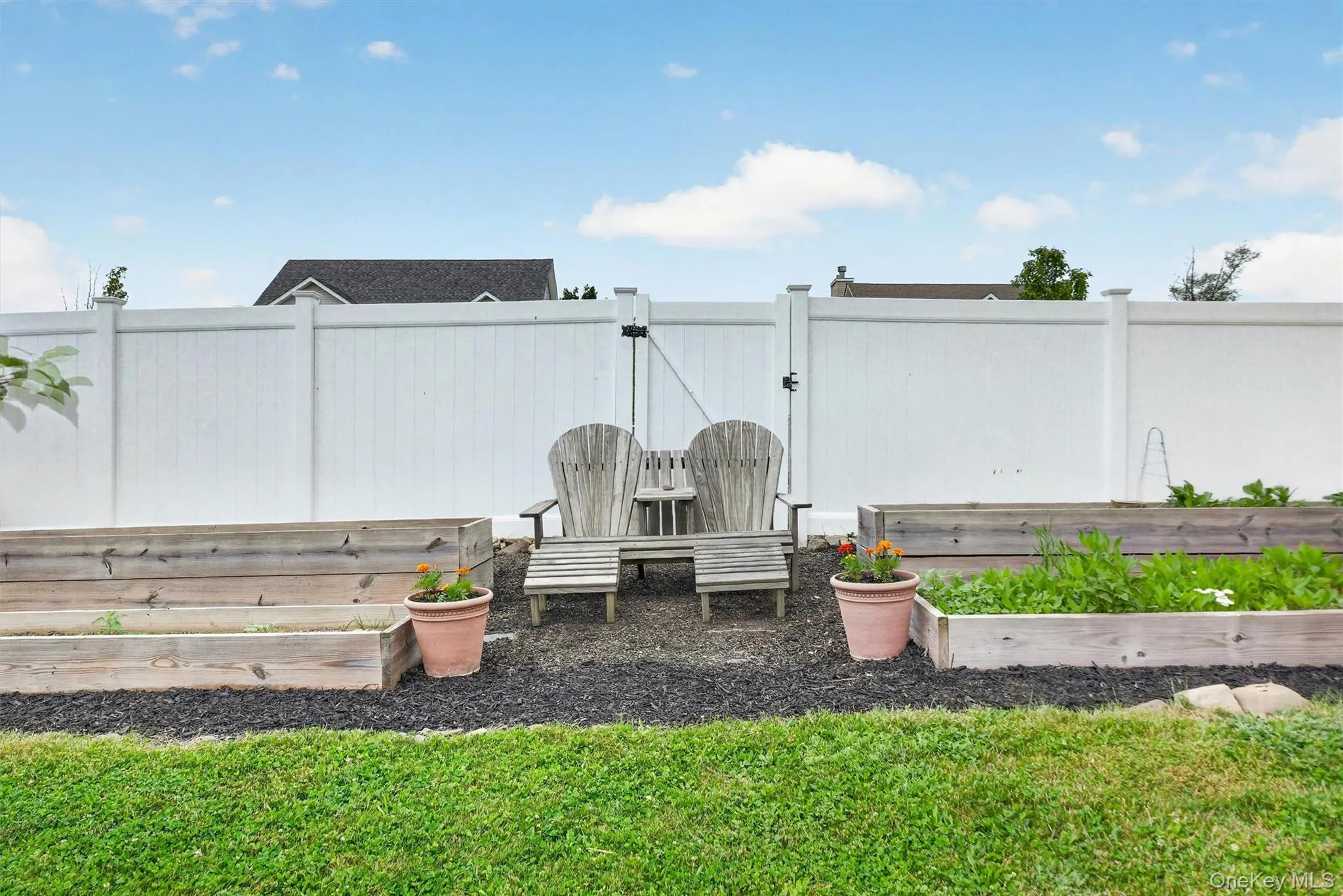 Garden with Perennials, Pergola, and Raised Beds Garden with Perennials, Pergola, and Raised Beds