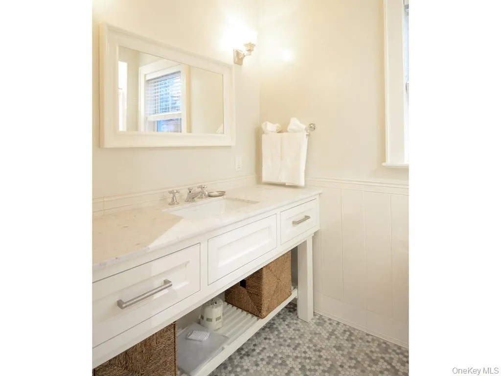 Second floor hall bath with custom sink, tile and tub/shower (not shown.) Second floor hall bath with custom sink, tile and tub/shower (not shown.)