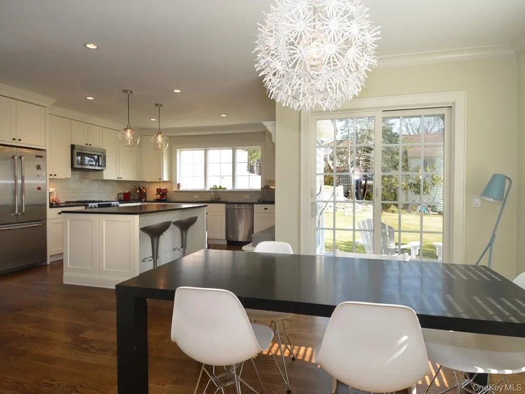 Dining room with sliding doors to backyard. Dining room with sliding doors to backyard.