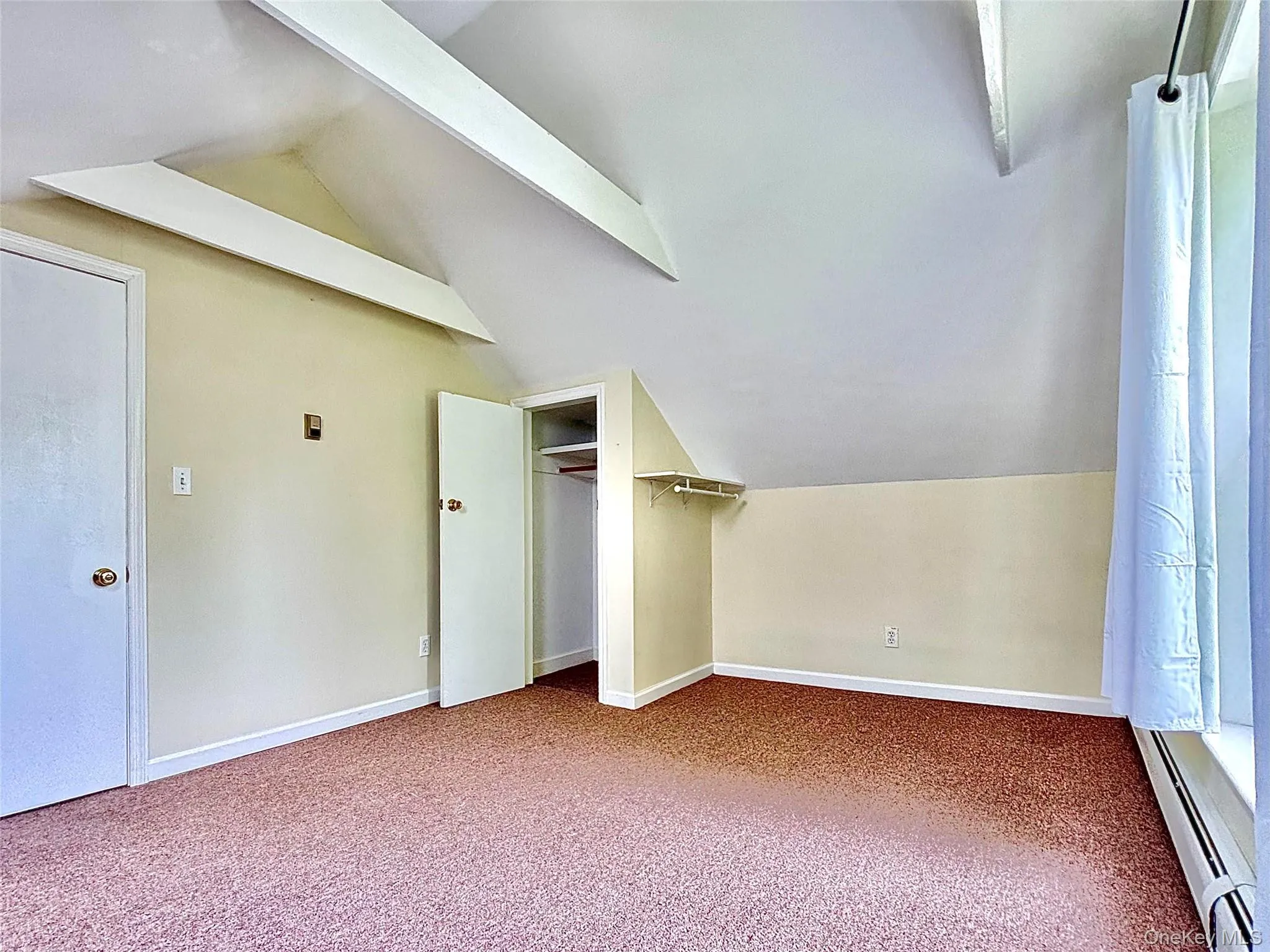 Primary Bedroom with beamed and vaulted ceiling Primary Bedroom with beamed and vaulted ceiling