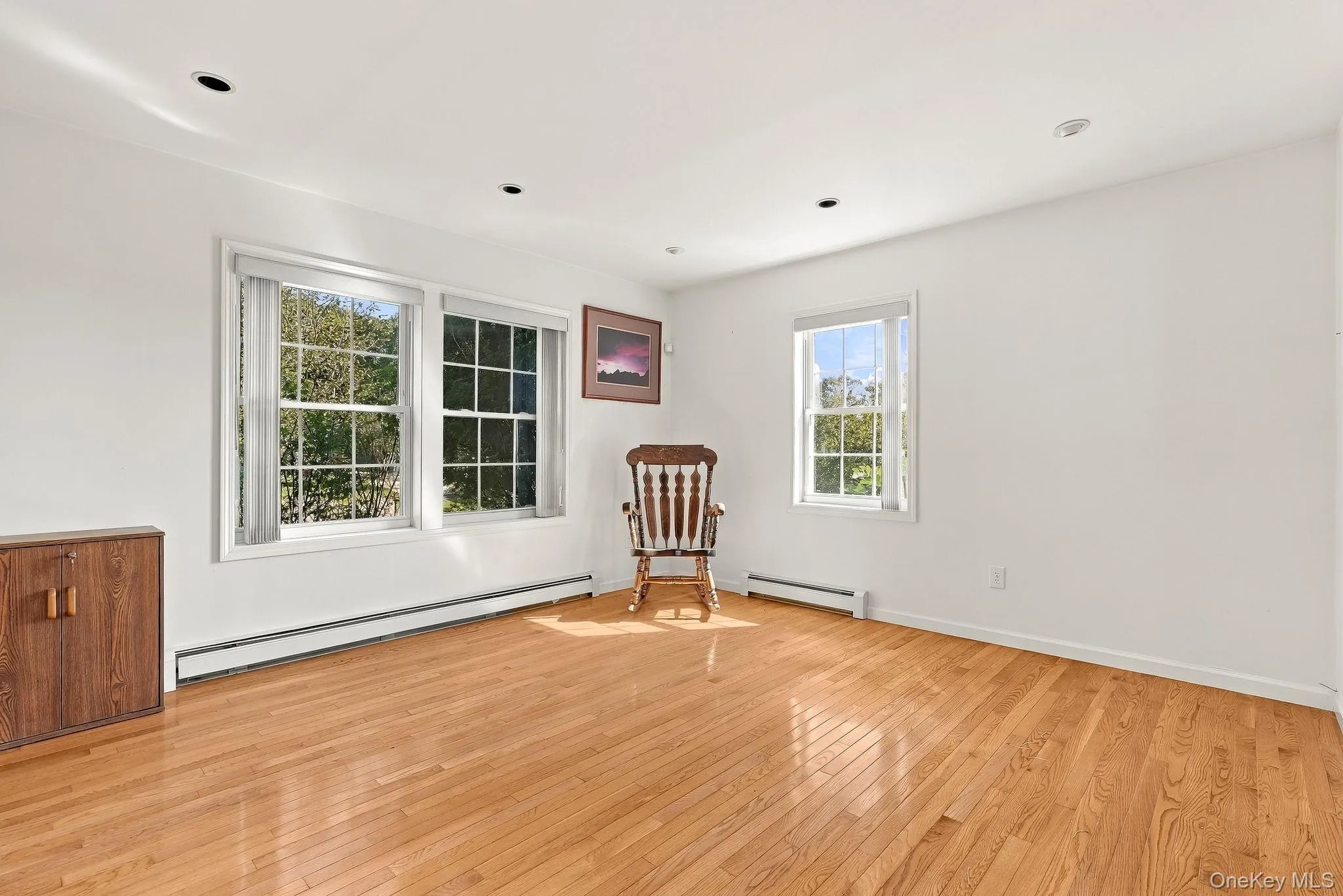 Gleaming hardwood floors can be found throughout the home. There is no lack of warmth or light. Gleaming hardwood floors can be found throughout the home. There is no lack of warmth or light.