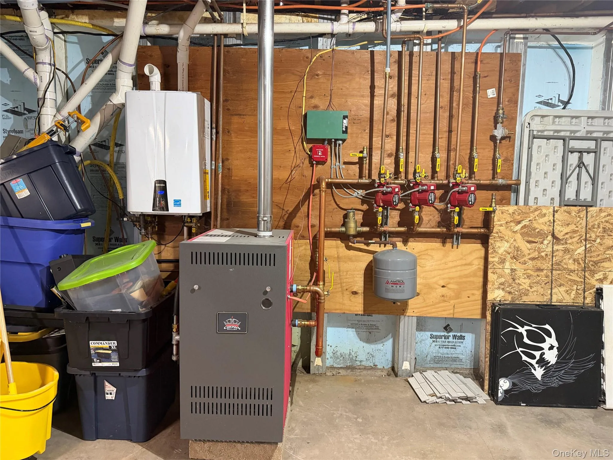 In basement. 2 year old furnace, Navien instant hot water system In basement. 2 year old furnace, Navien instant hot water system