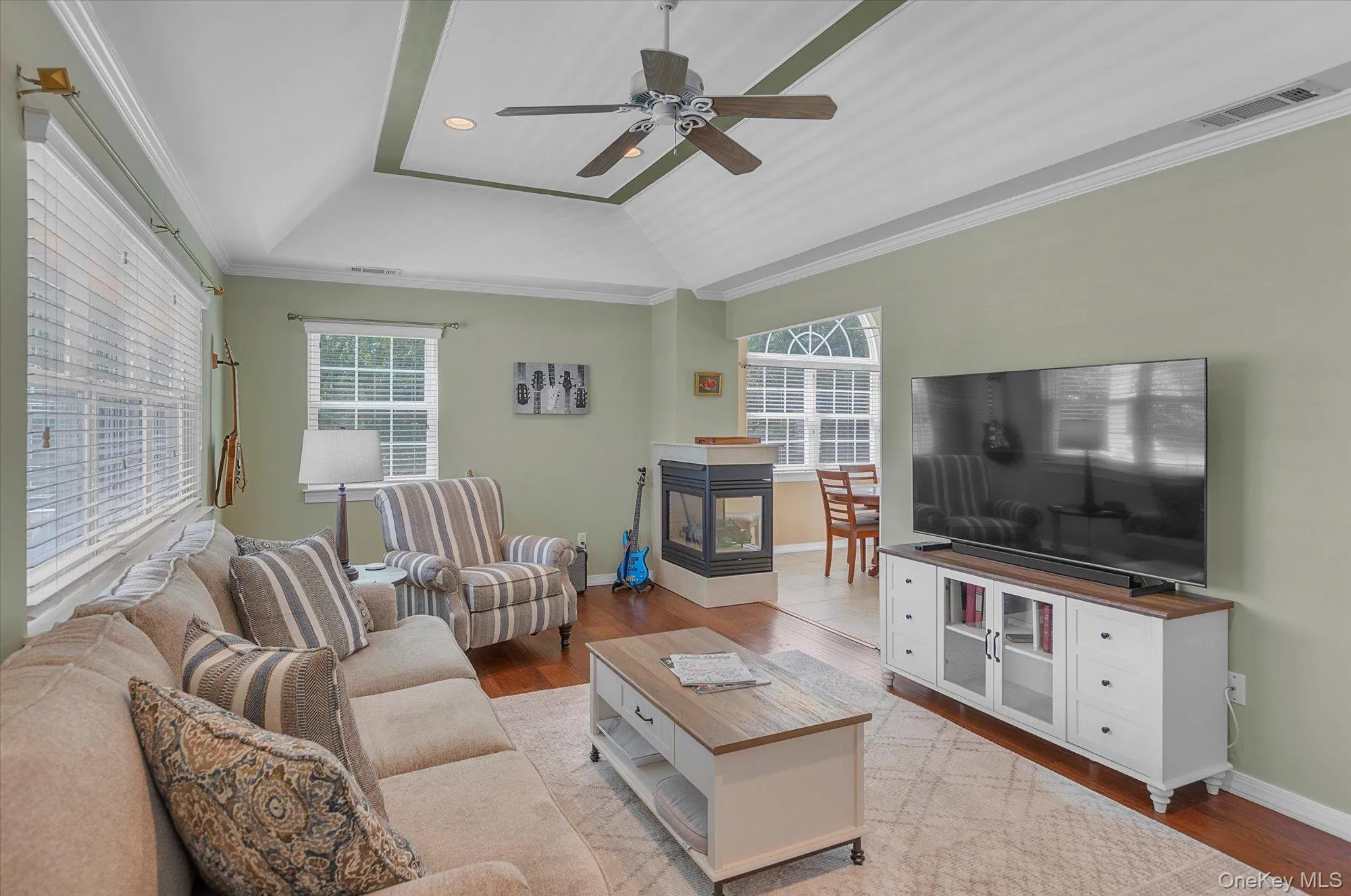 Lots of natural light. Trey Ceiling. Wood Floors. Gas Fireplace. Lots of natural light. Trey Ceiling. Wood Floors. Gas Fireplace.