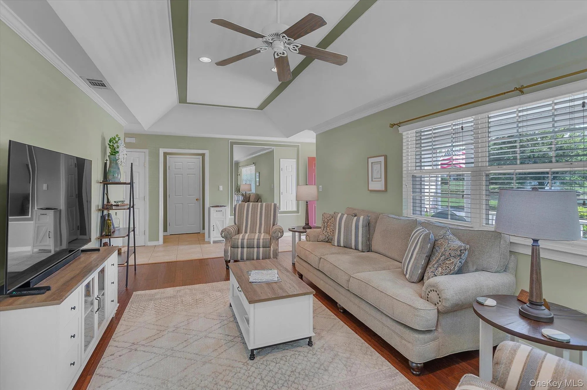 Ceiling Fan. Wood Floors. Ceiling Fan. Wood Floors.
